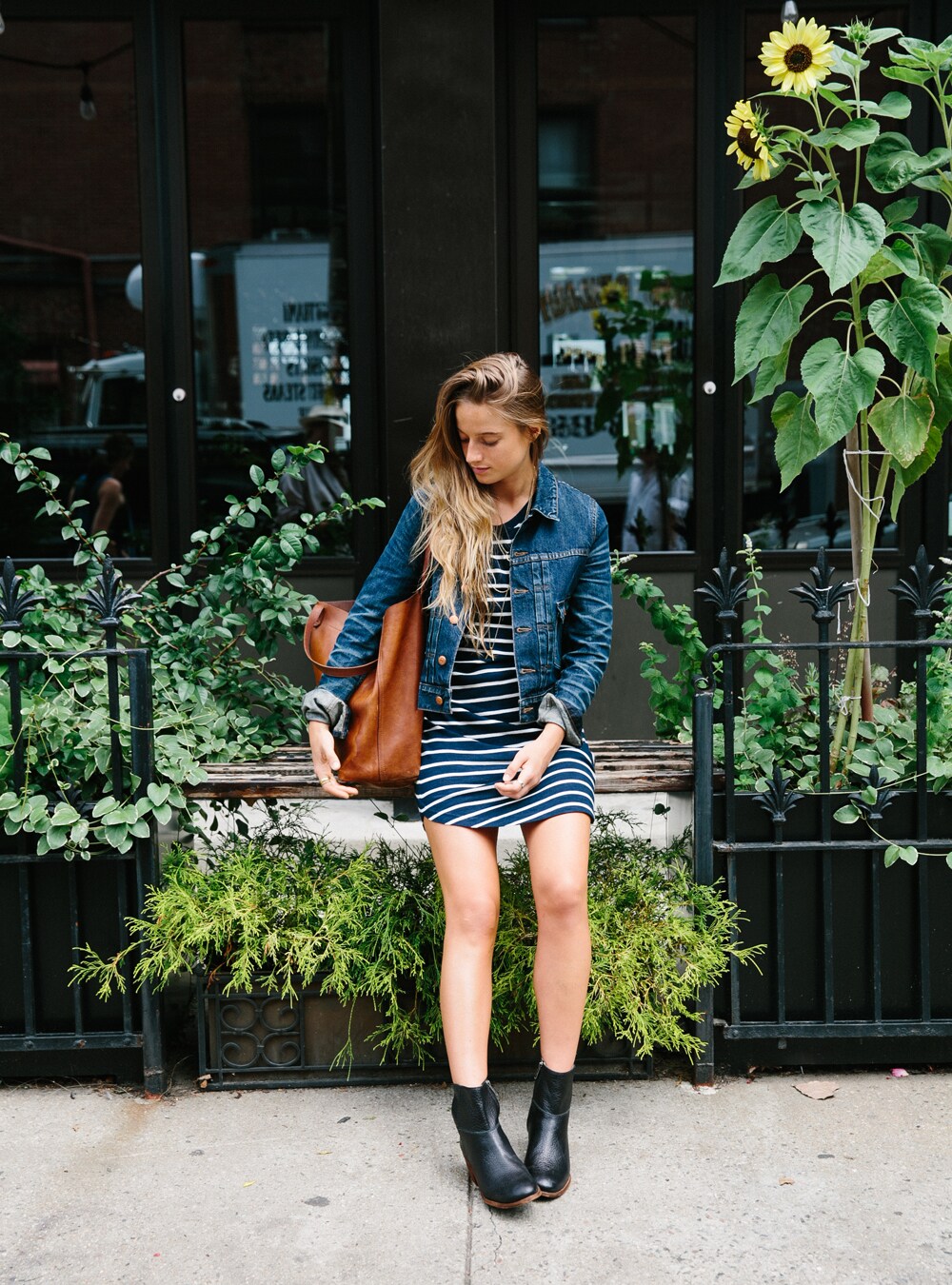 Fernanda wears our Cointoss Dress, Jean Jacket and her own boots.