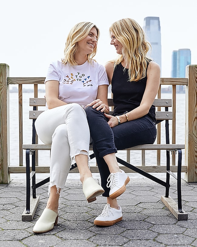 Beth wears the Madewell x Human Rights Campaign Love To All Pride Tee, Perfect Vintage Crop Jean and Harper Mule. Charlotte wears the Audio Knot-Front Tank Top, Slim Jeans and Sidewalk Low-Top Sneakers.