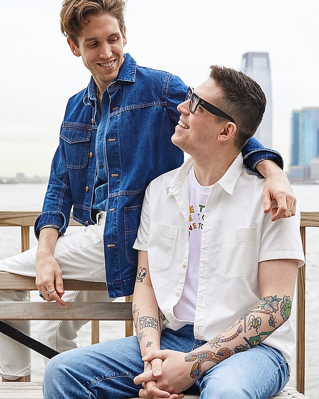 Wesley wears the Oversized Denim Chore Jacket, Short-Sleeve Button-Down Workshirt and Skinny Jeans. Maxwell wears the Short-Sleeve Button-Down Workshirt, Madewell x Human Rights Campaign Love To All Pride Tee and Straight Jeans.