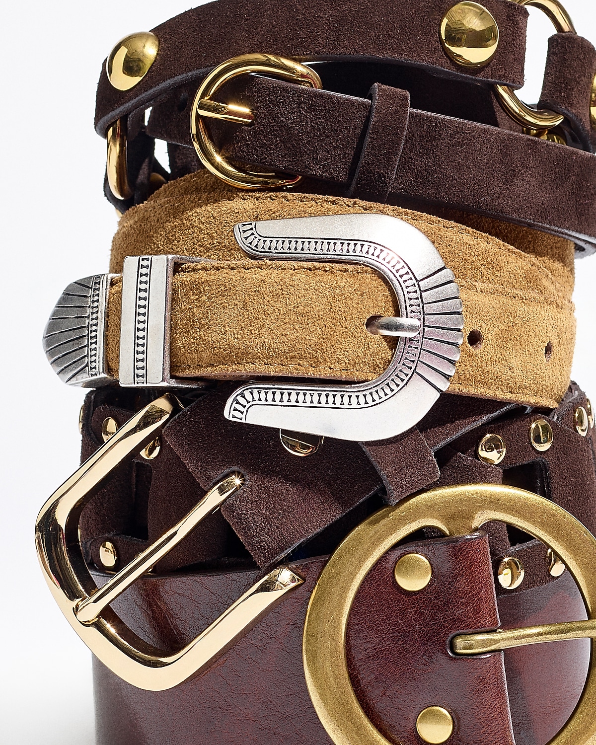 man standing in front of a parachute with classic beige shorts, white top, and a beige shirt