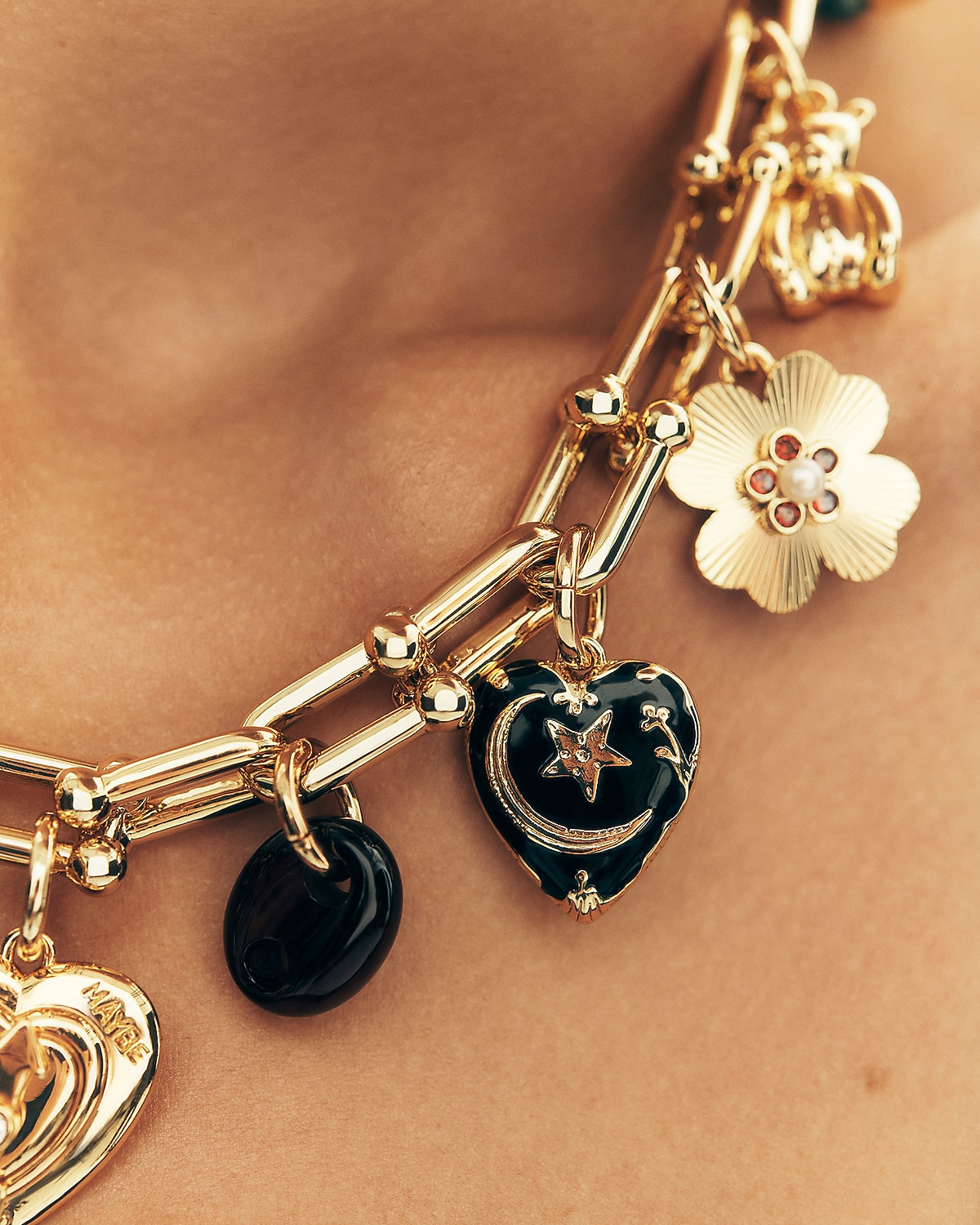 man standing in front of a parachute with classic beige shorts, white top, and a beige shirt