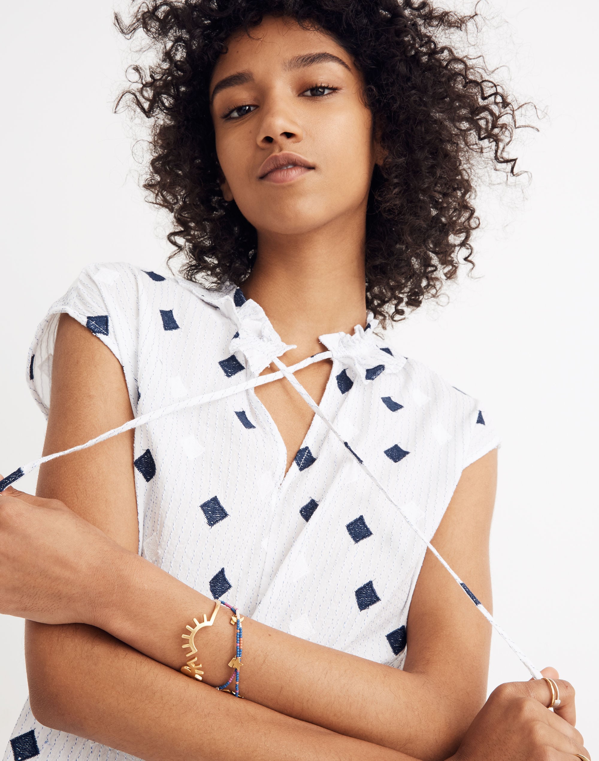 ruffle-neck tassel top
