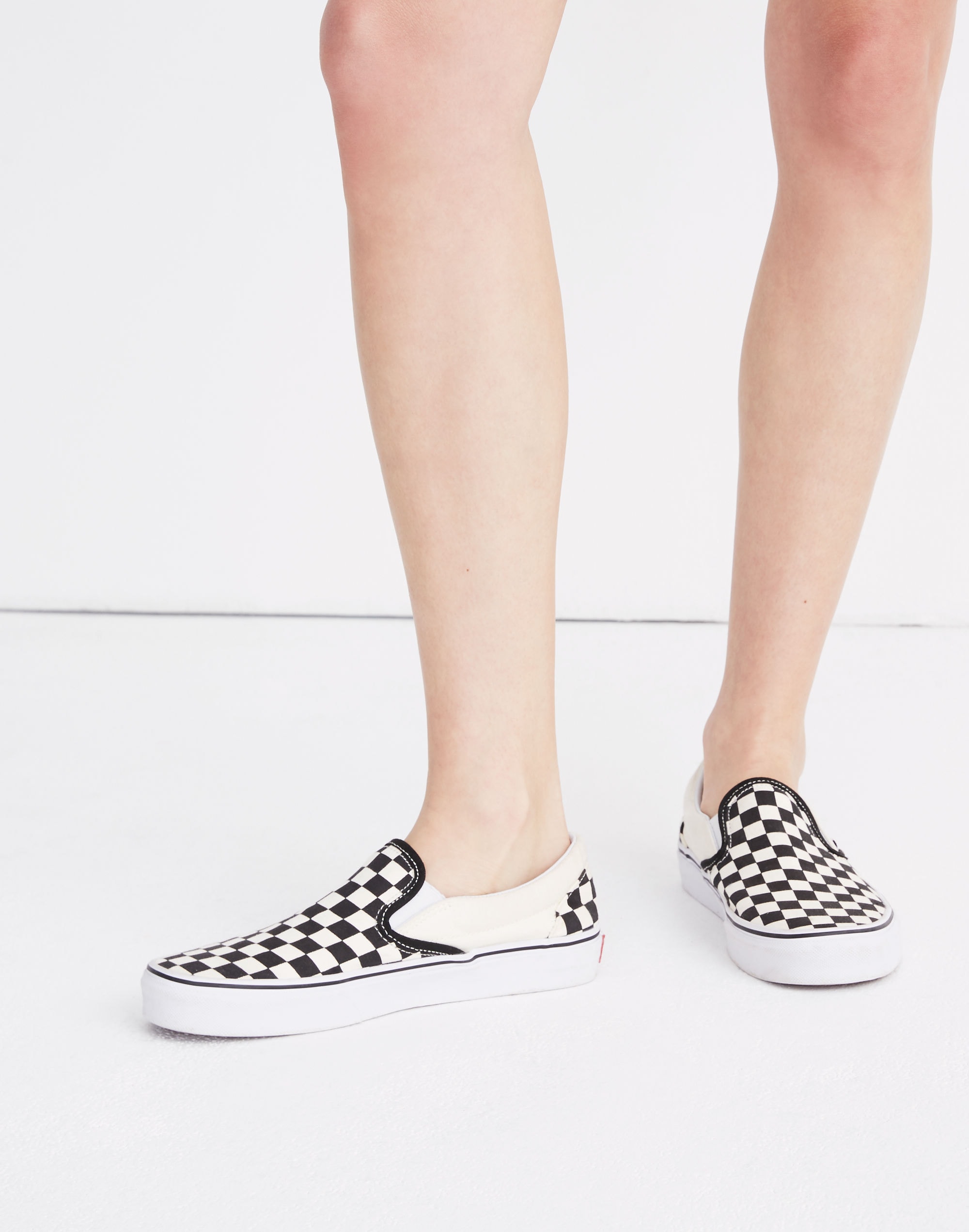 Vans&reg; Unisex Classic Slip-On Sneakers in Black Checkerboard