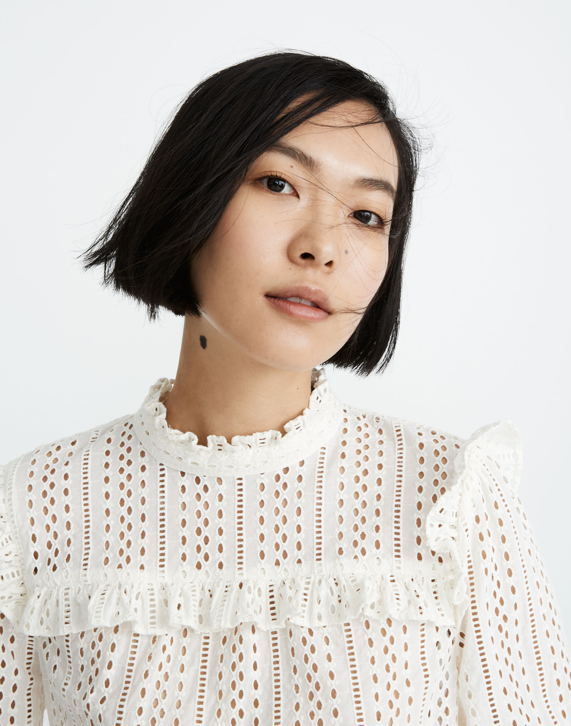 Eyelet Mockneck Ruffle Top