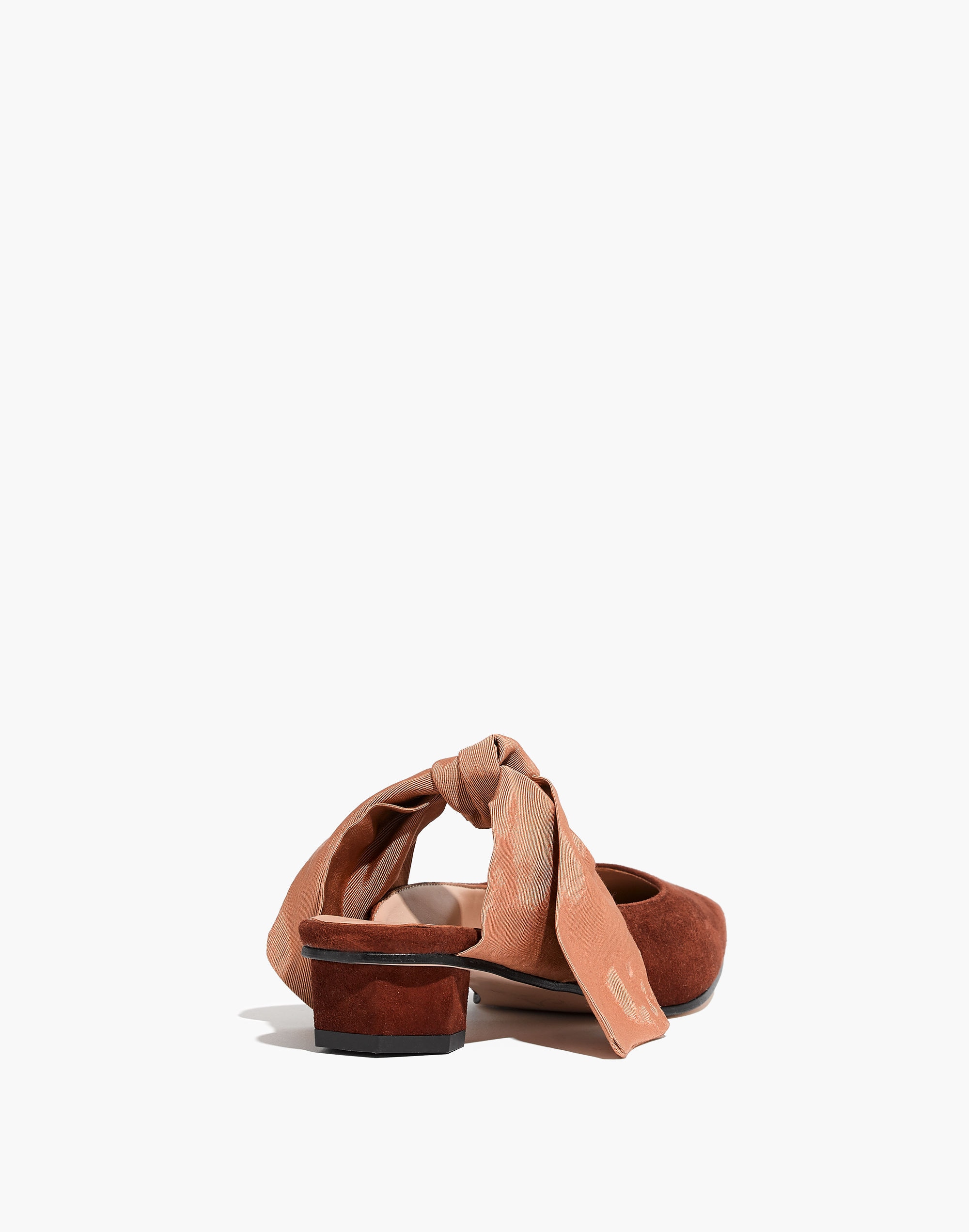 About Arianne Tina Suede Bow Mules