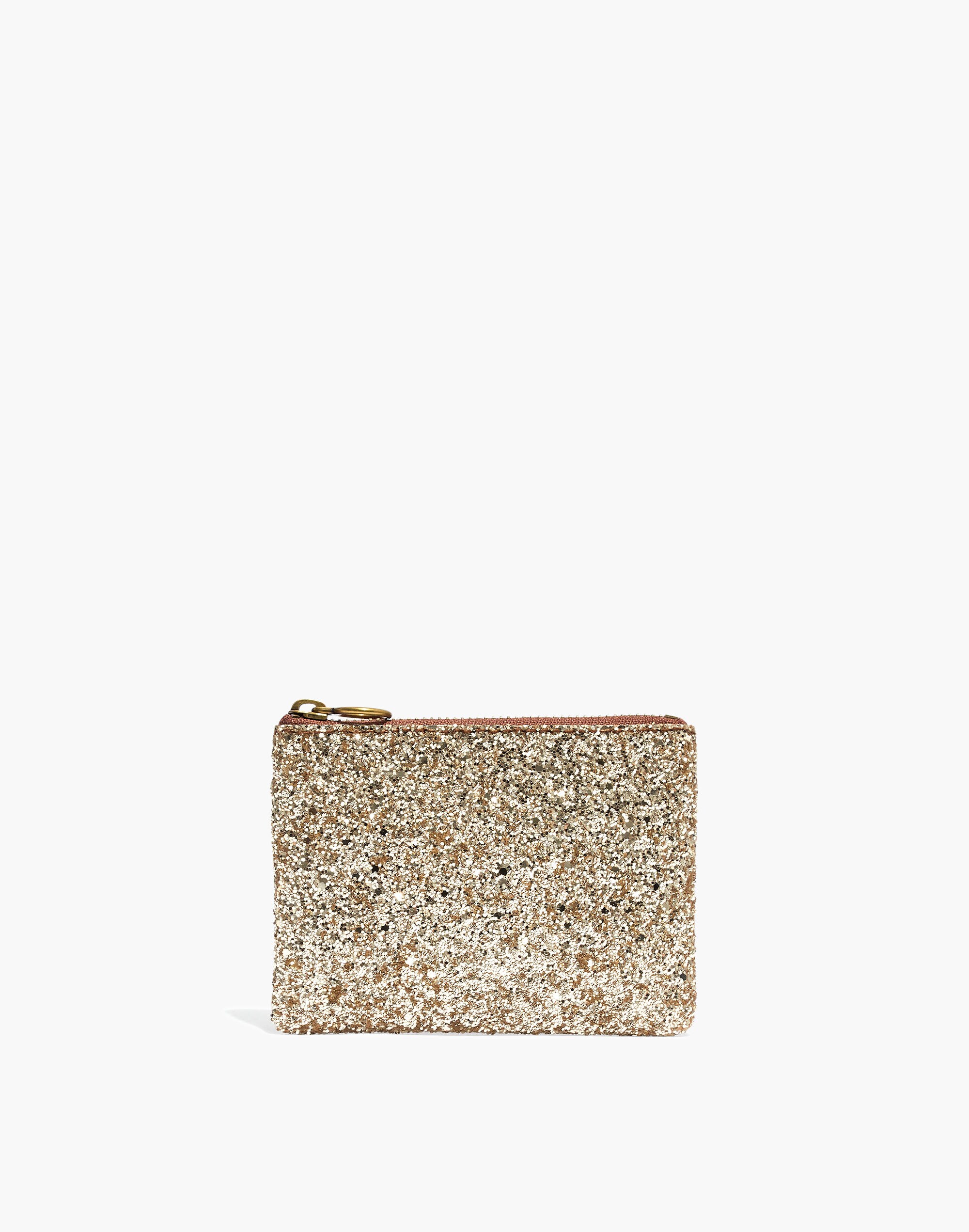 the leather pouch clutch in glitter