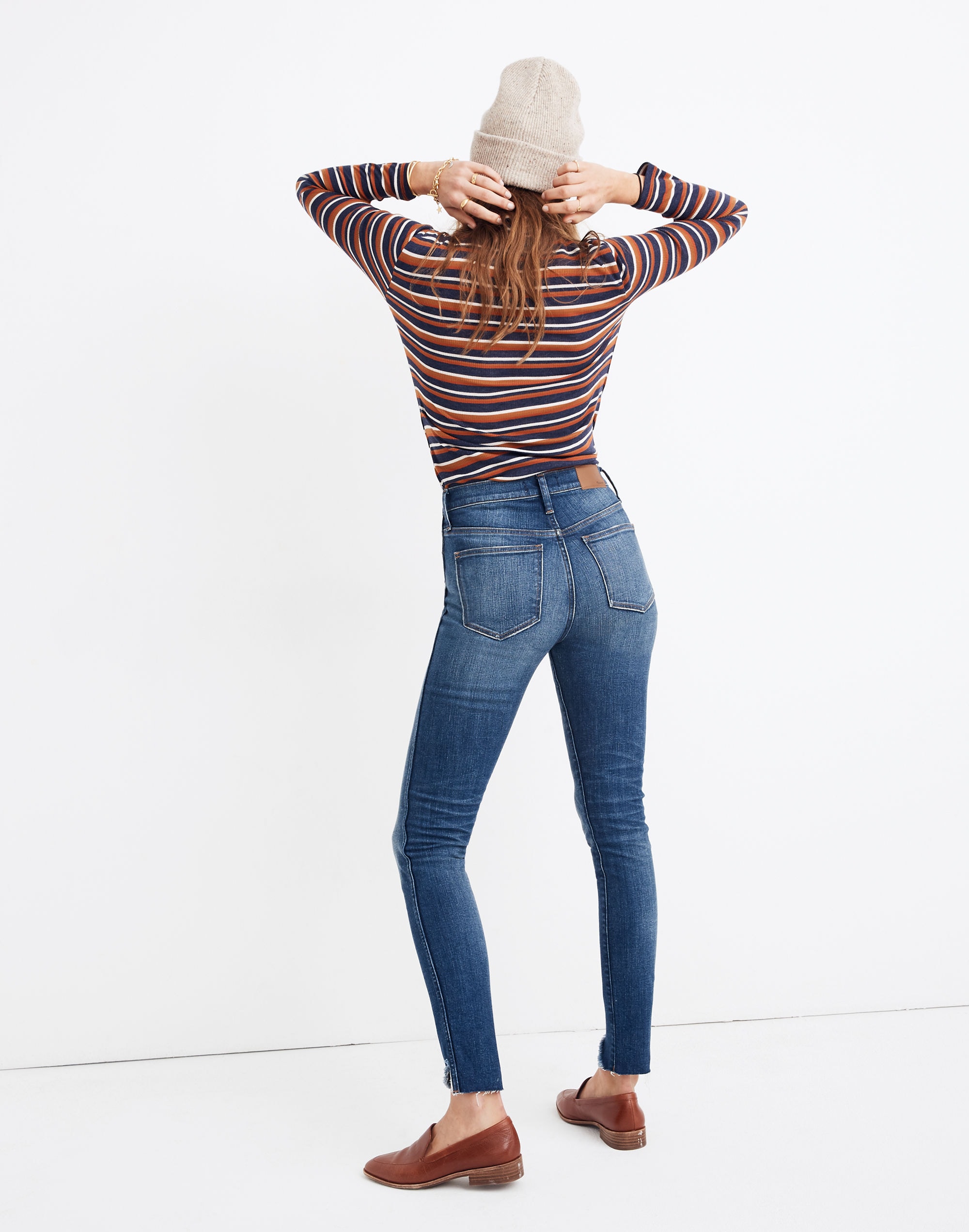 10" High-Rise Skinny Jeans: Cutout Tulip Hem Edition