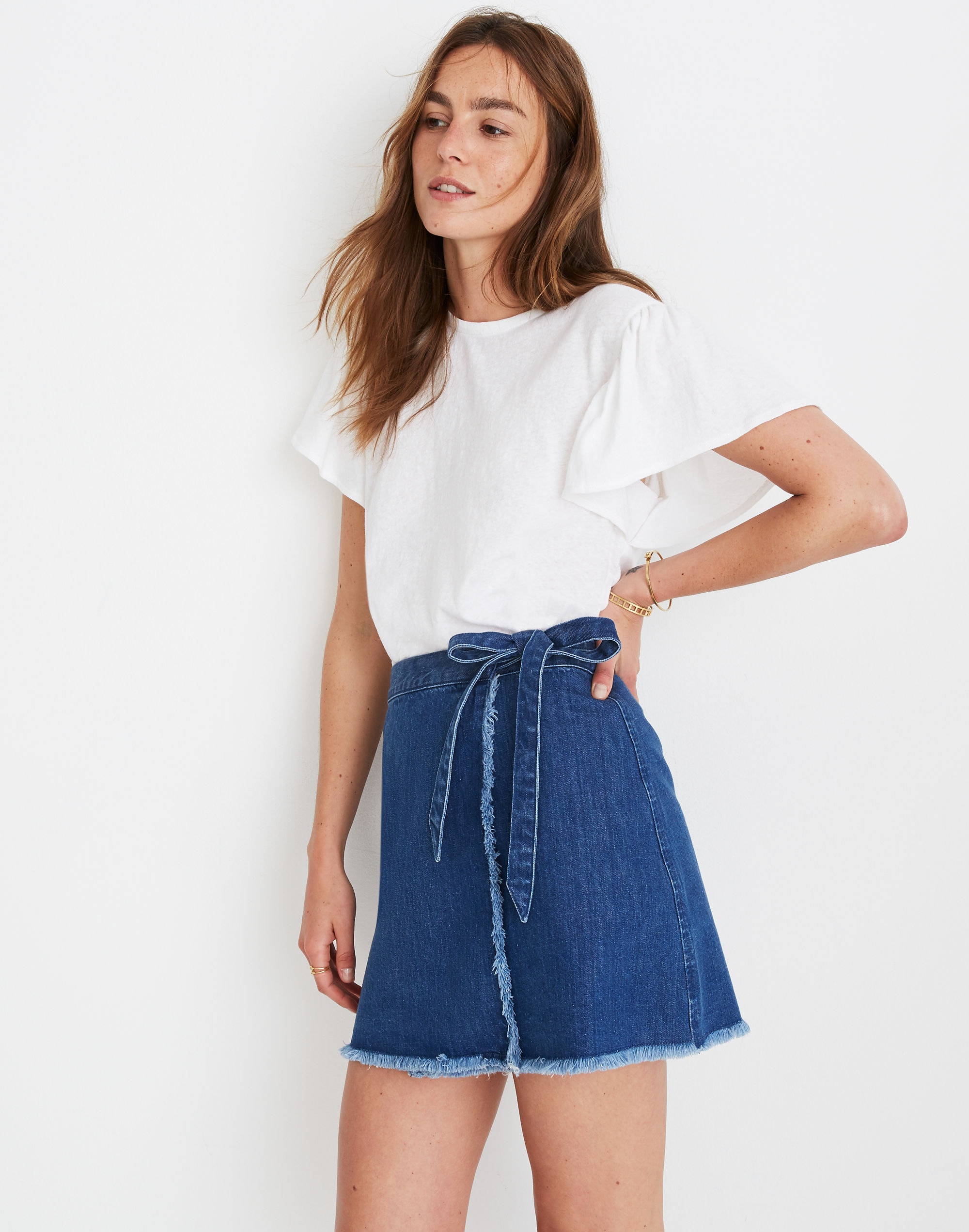 raw-hem mini wrap skirt in cardiff wash