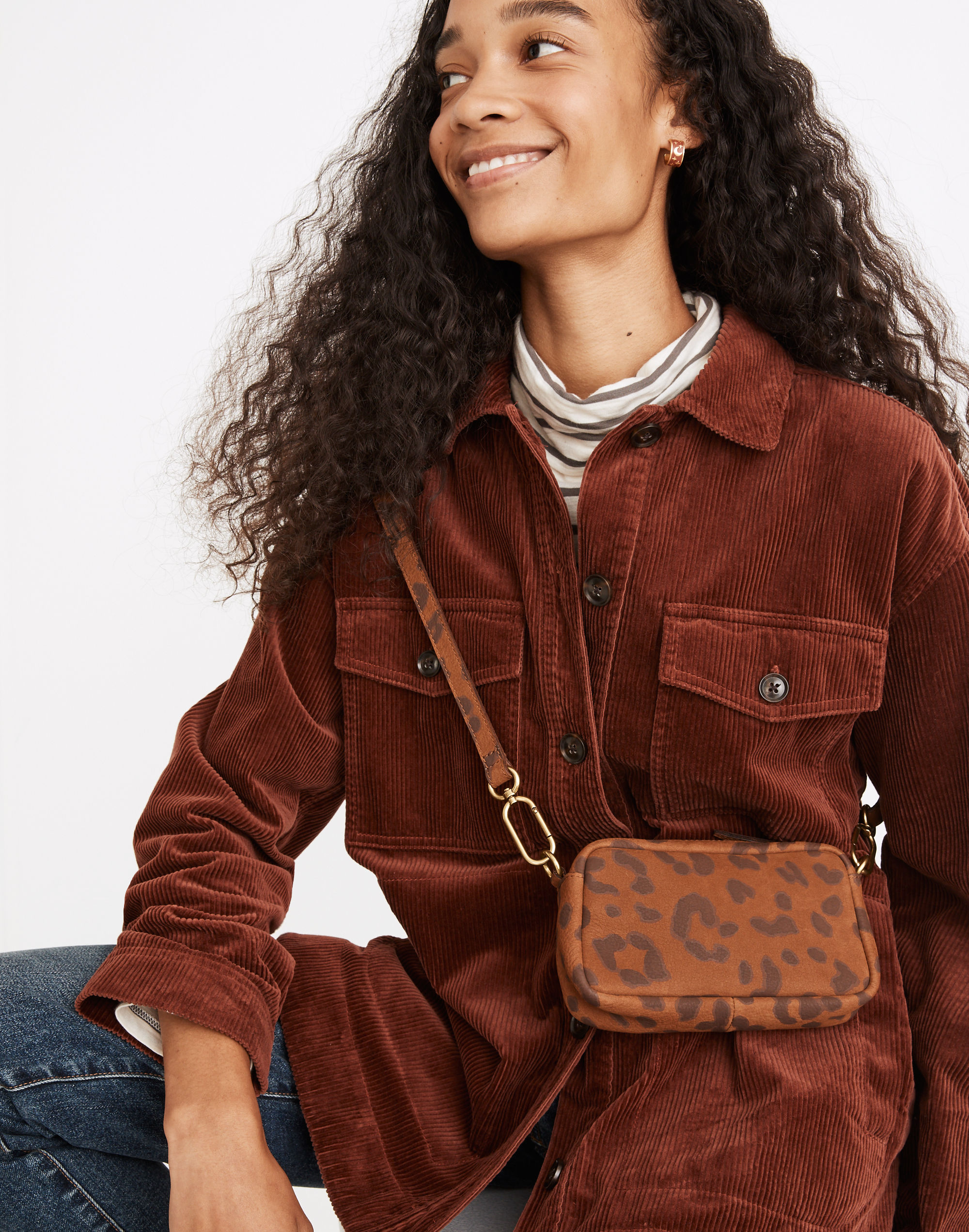 The Nubuck Carabiner Mini Crossbody Bag in Leopard Print