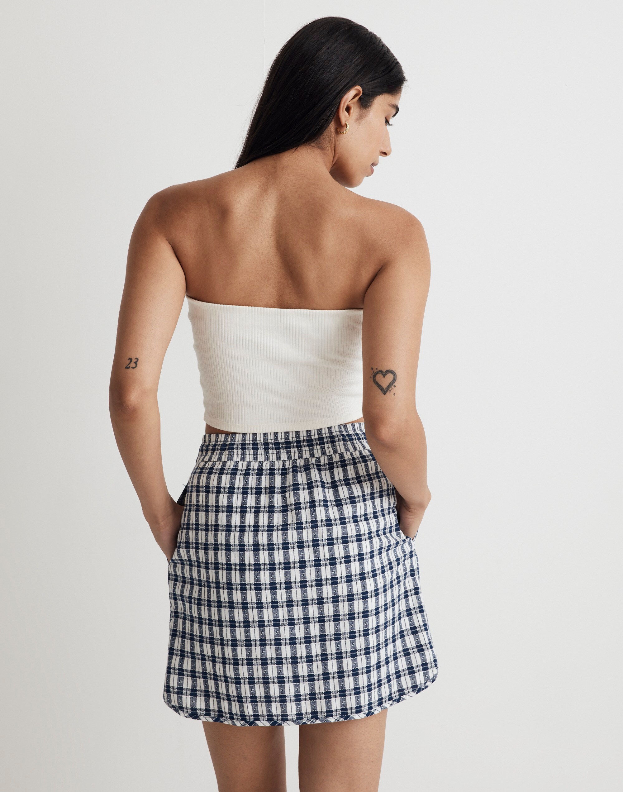 Curved-Hem Mini Skirt in Plaid