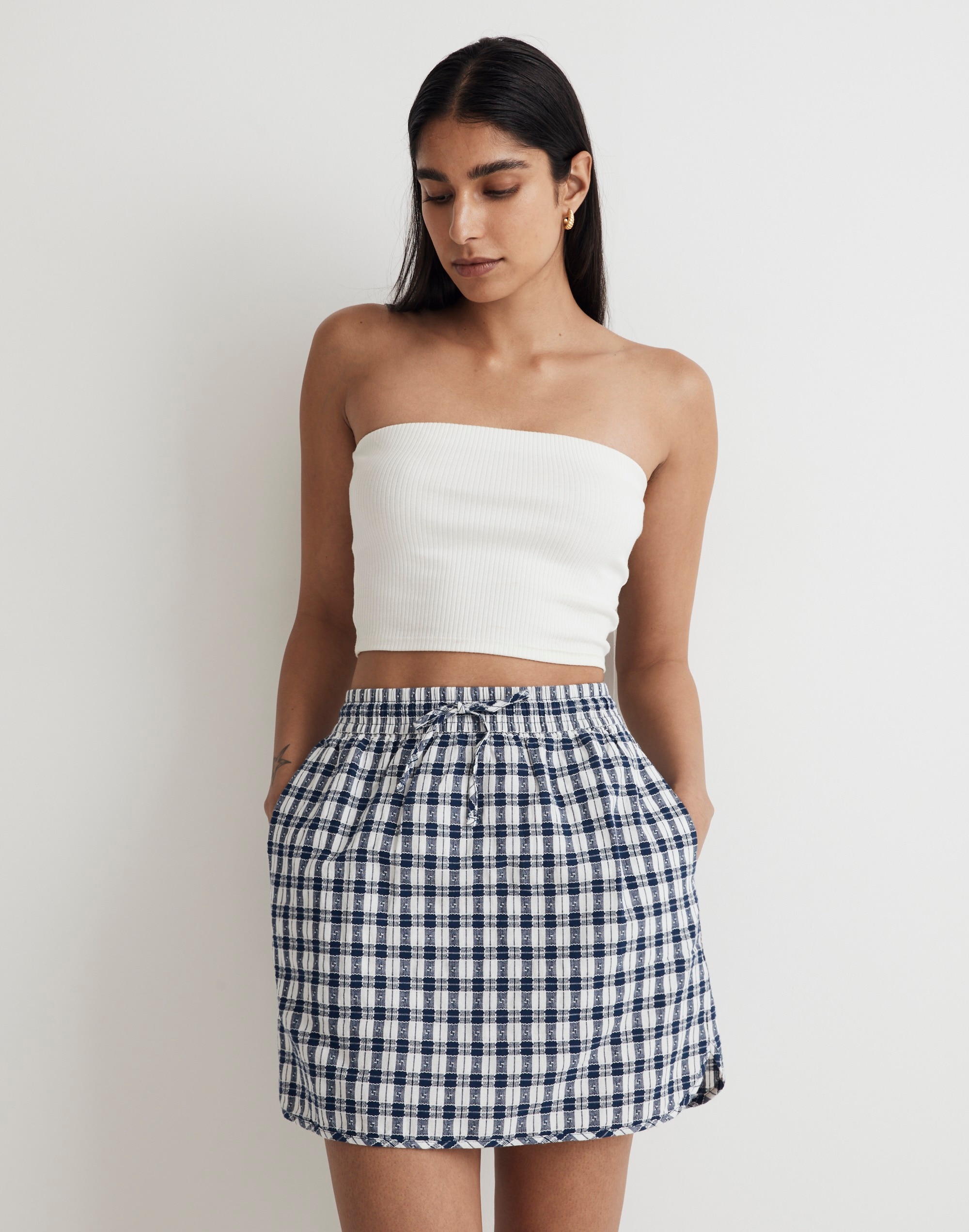 Curved-Hem Mini Skirt in Plaid