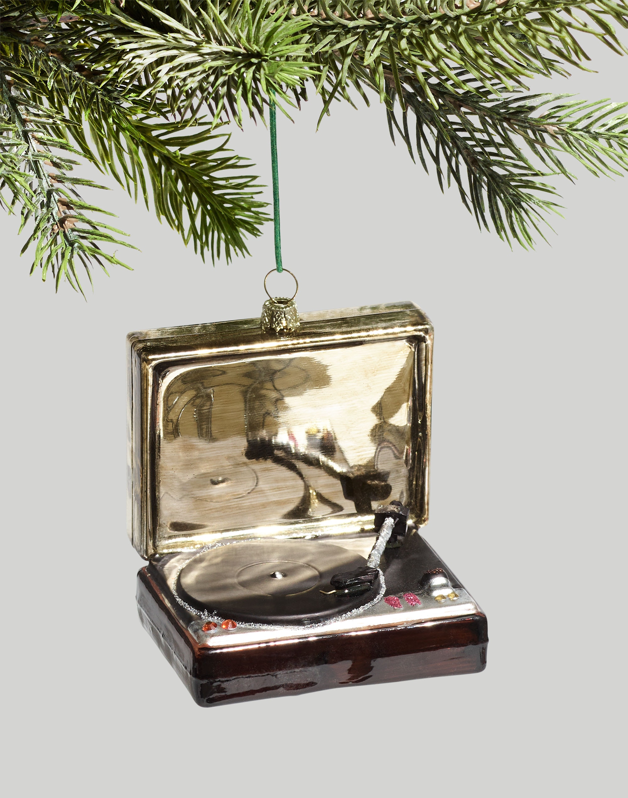 Hand-painted glass Christmas ornament shaped like a vintage turntable with a record on the platter