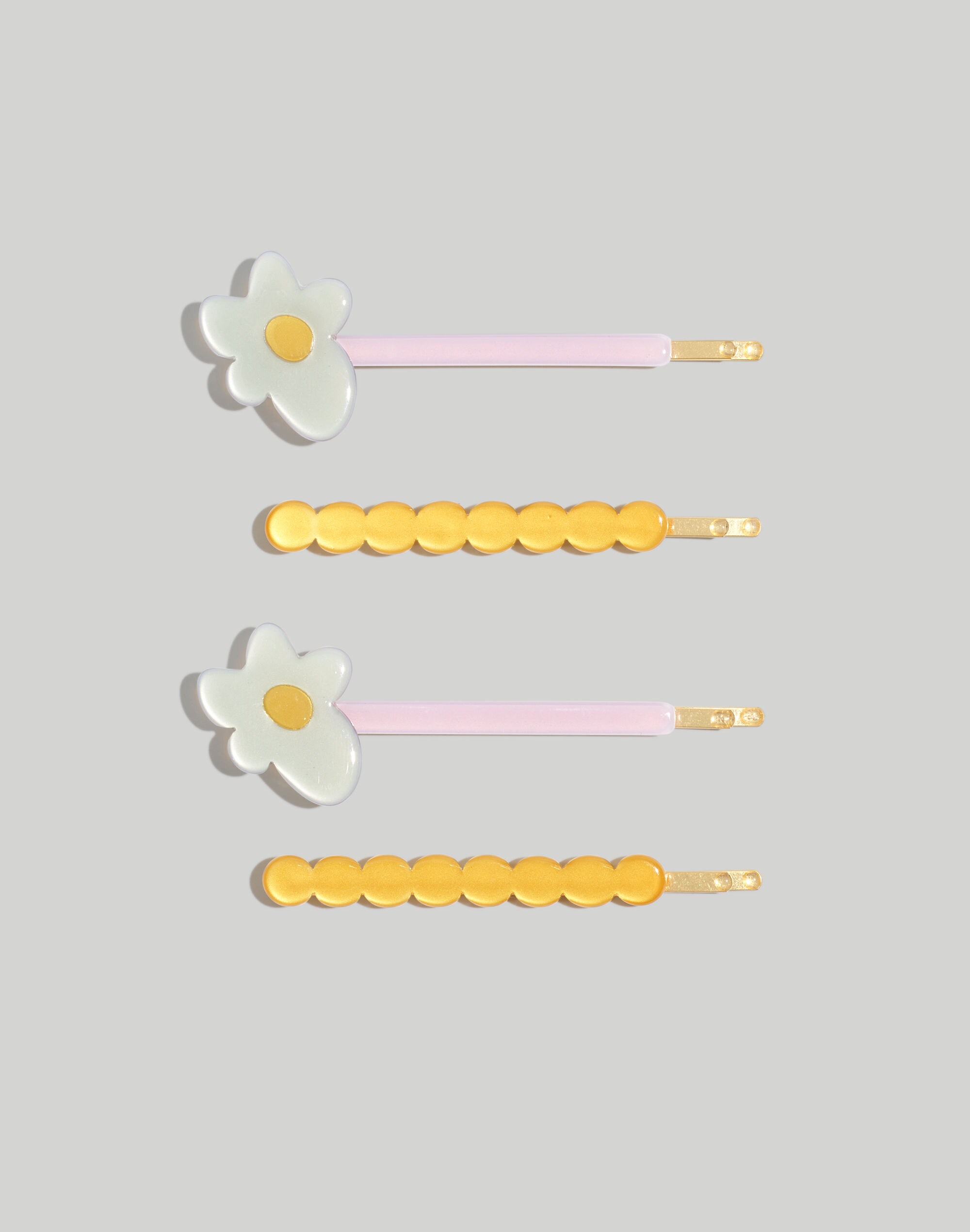 four-pack groovy hair pins
