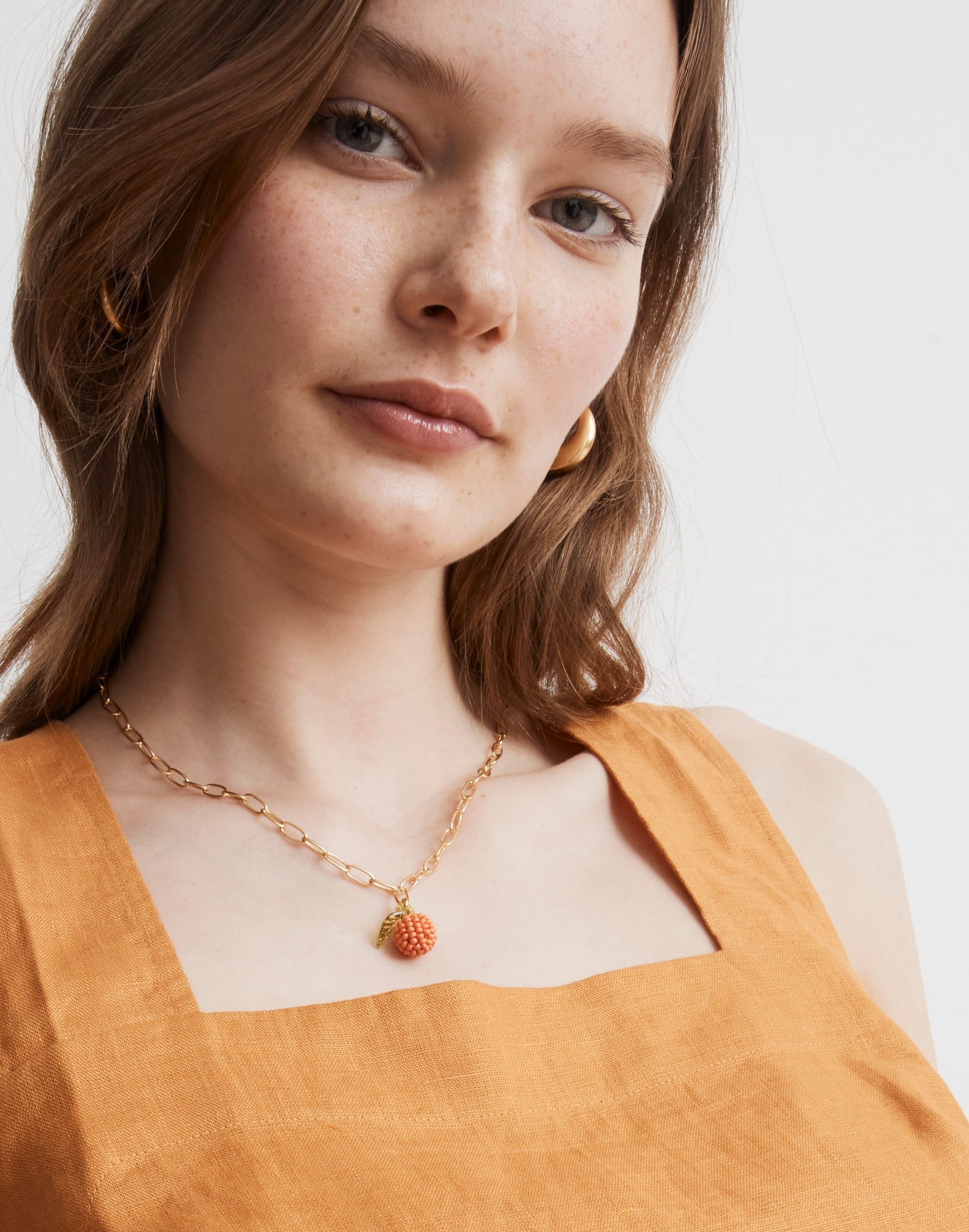 Orange Beaded Pendant Necklace