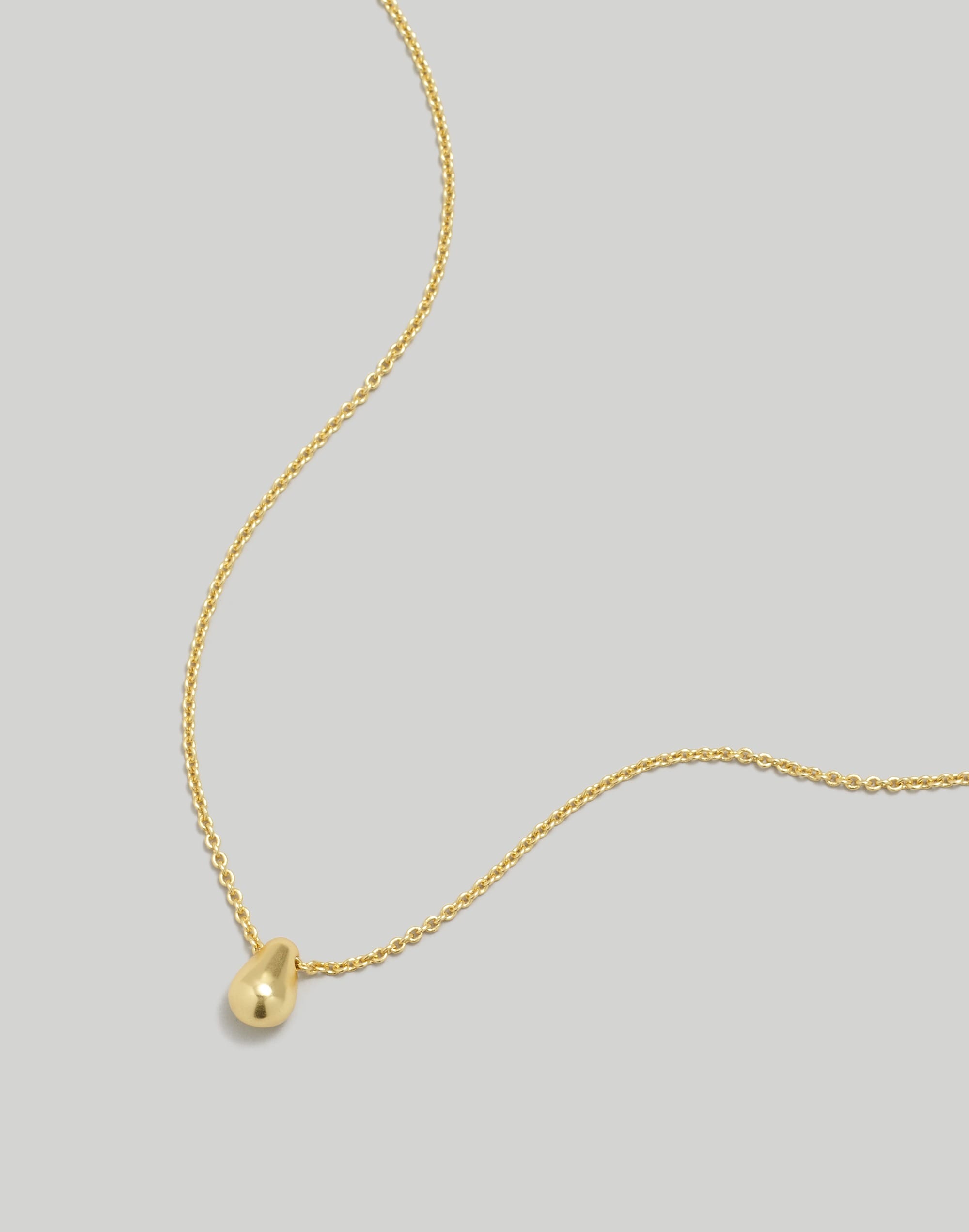 Small Pebble Pendant Necklace Gold Cord