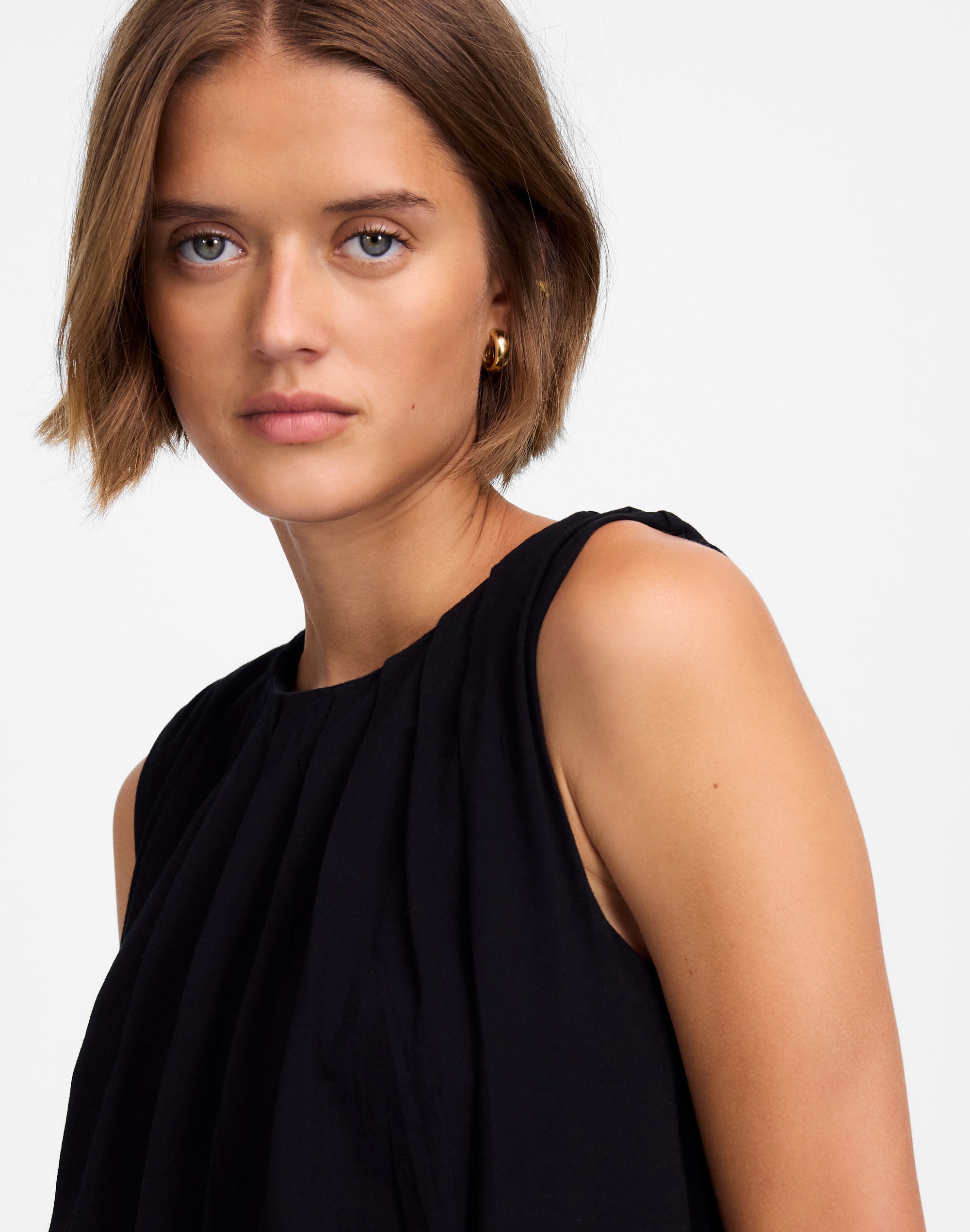 sleeveless crewneck bubble top