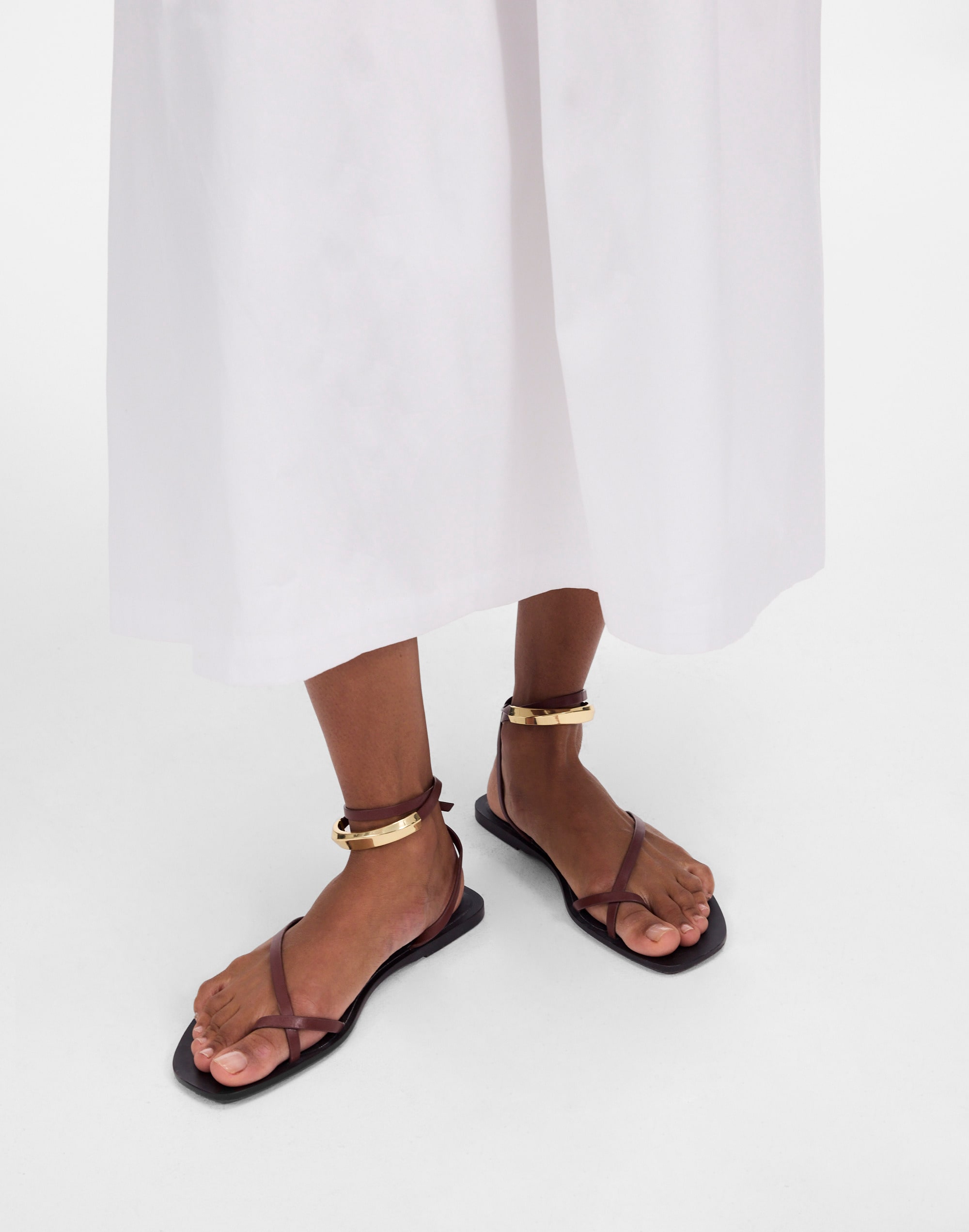 The Vira Bangle Ankle-Wrap Sandal in Leather