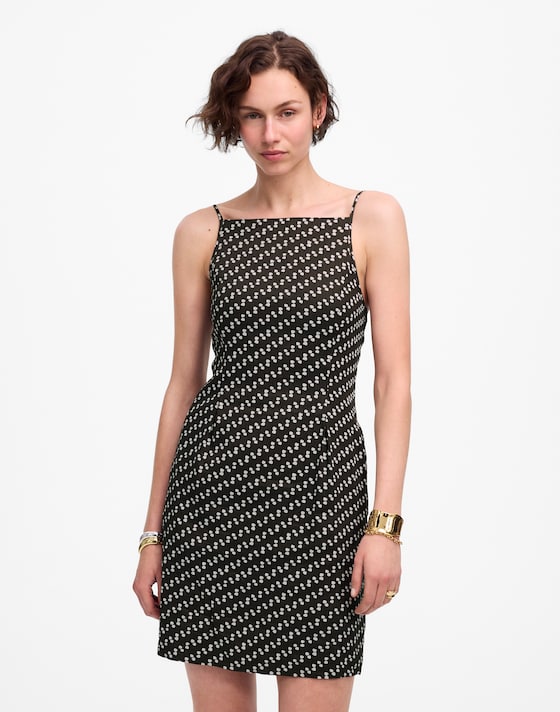 high neckline mini dress High-neck draped in red while additional draped overlays at the hips add volume and movement High-Neck Mini Dress in Dot