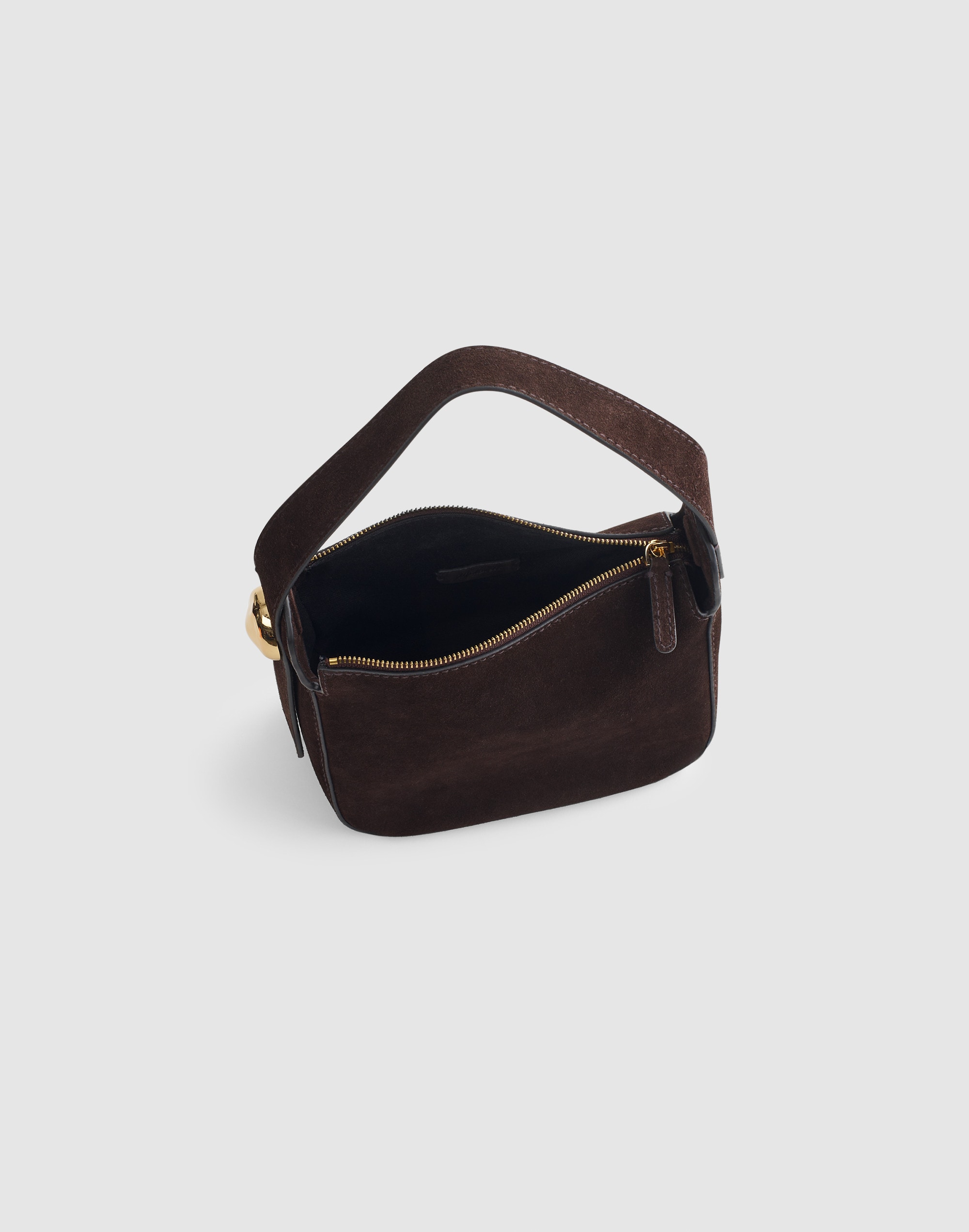 The Sculpted Metal Wristlet Bag