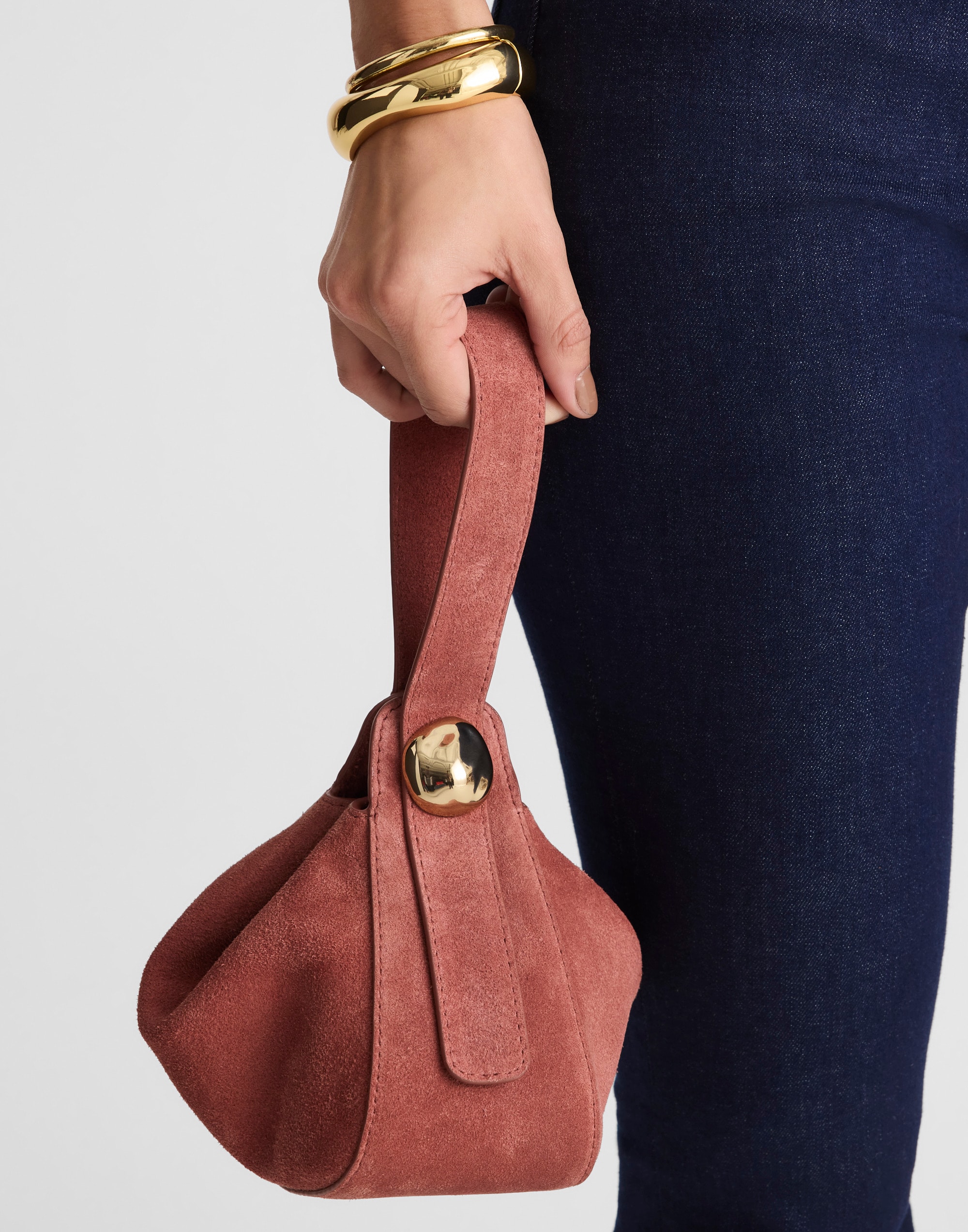 The Sculpted Metal Wristlet Bag