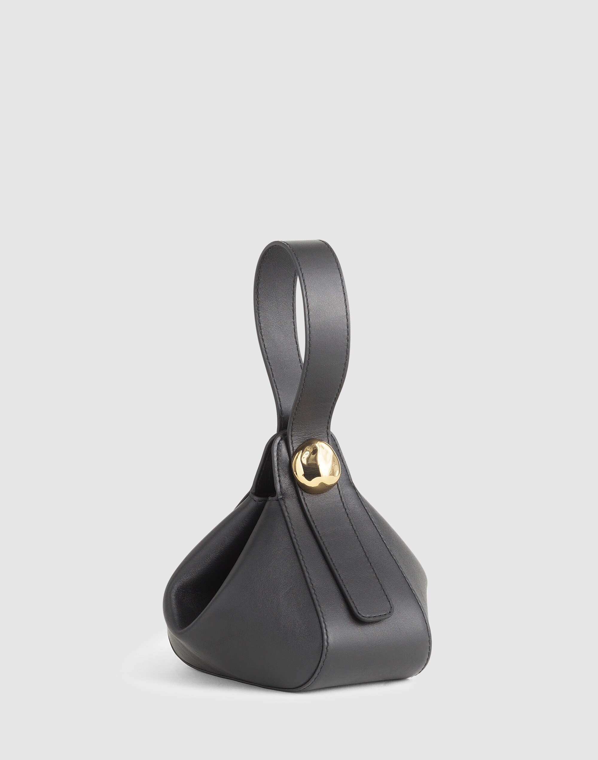 The Sculpted Metal Wristlet Bag