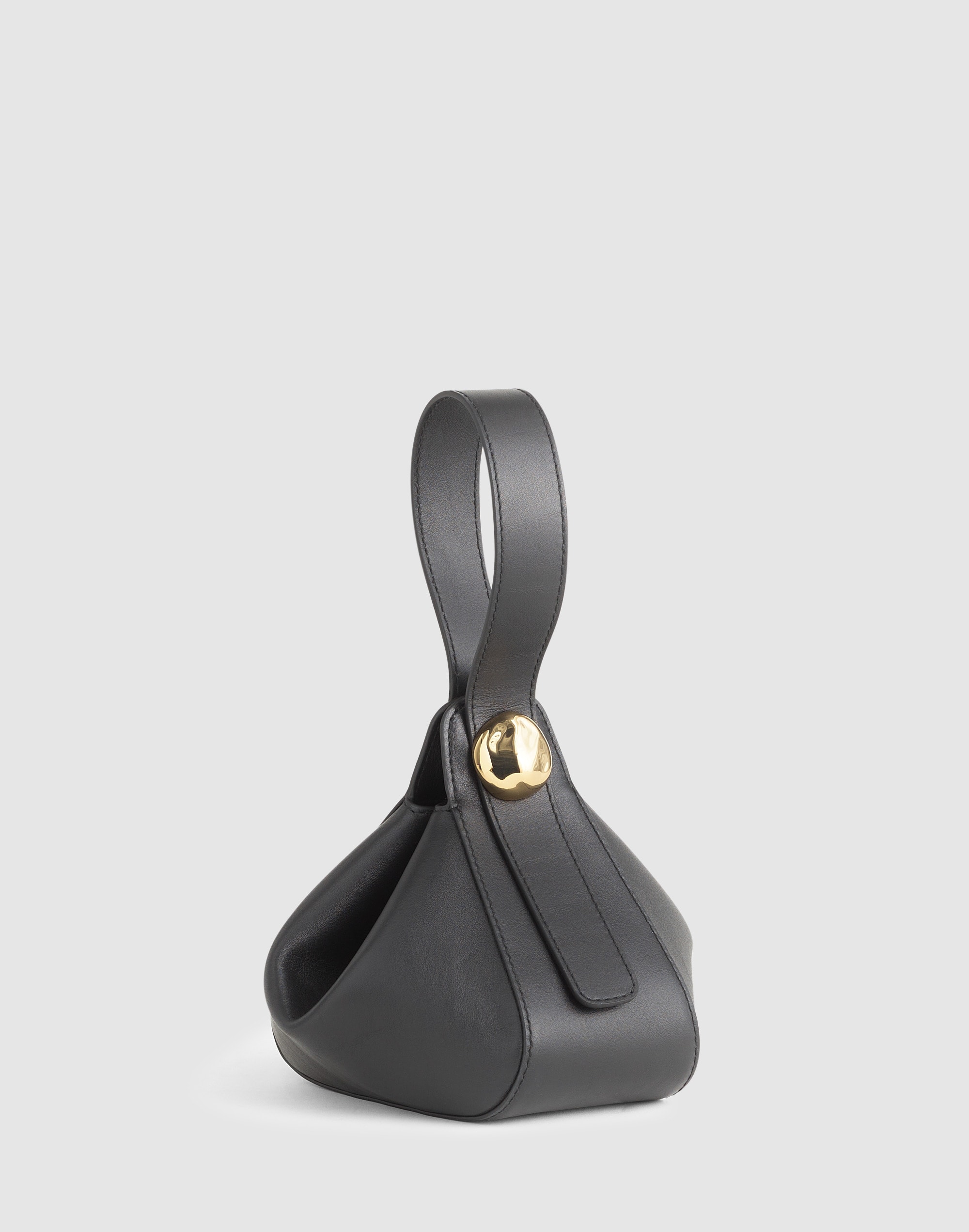 the sculpted metal wristlet bag