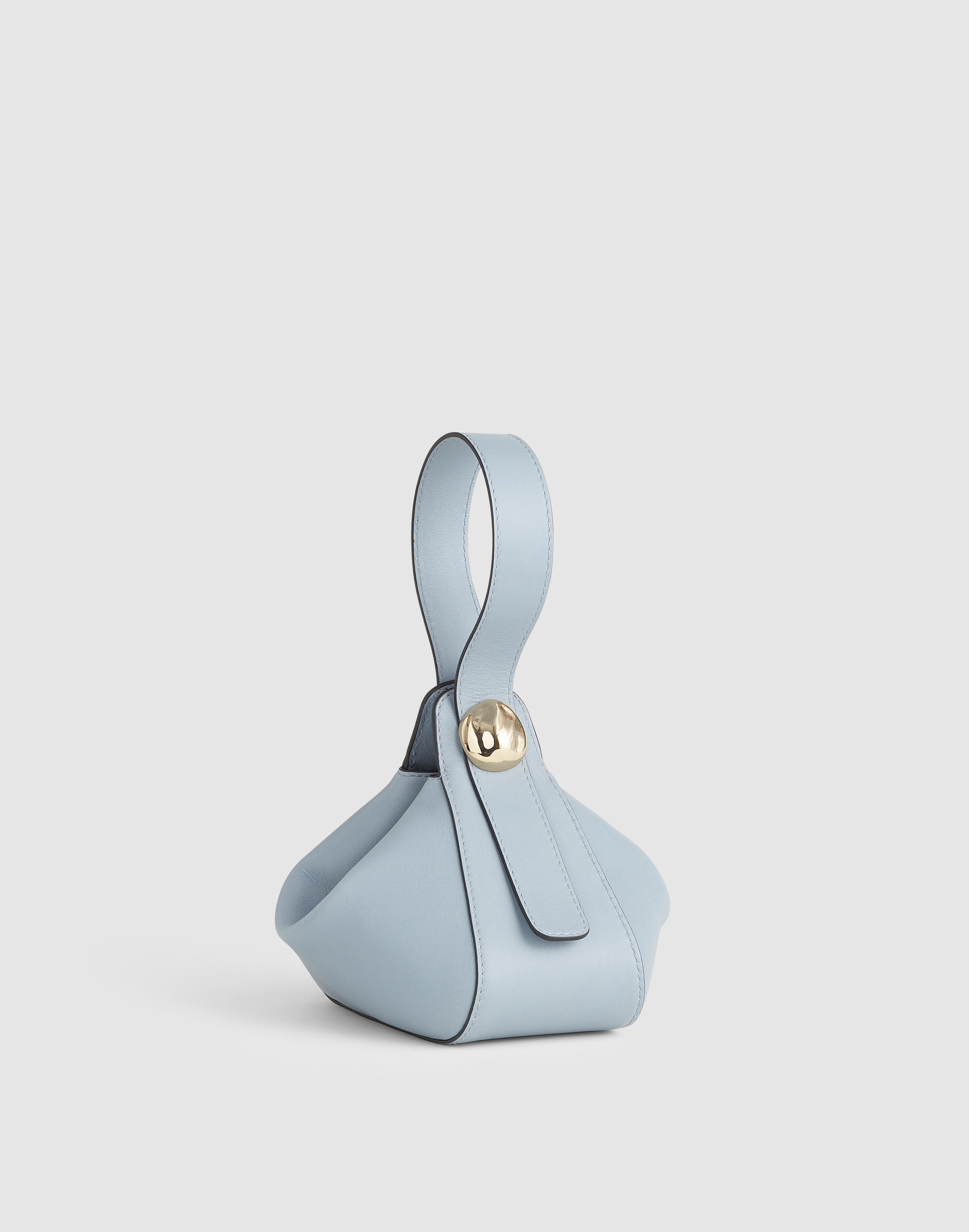 The Sculpted Metal Wristlet Bag