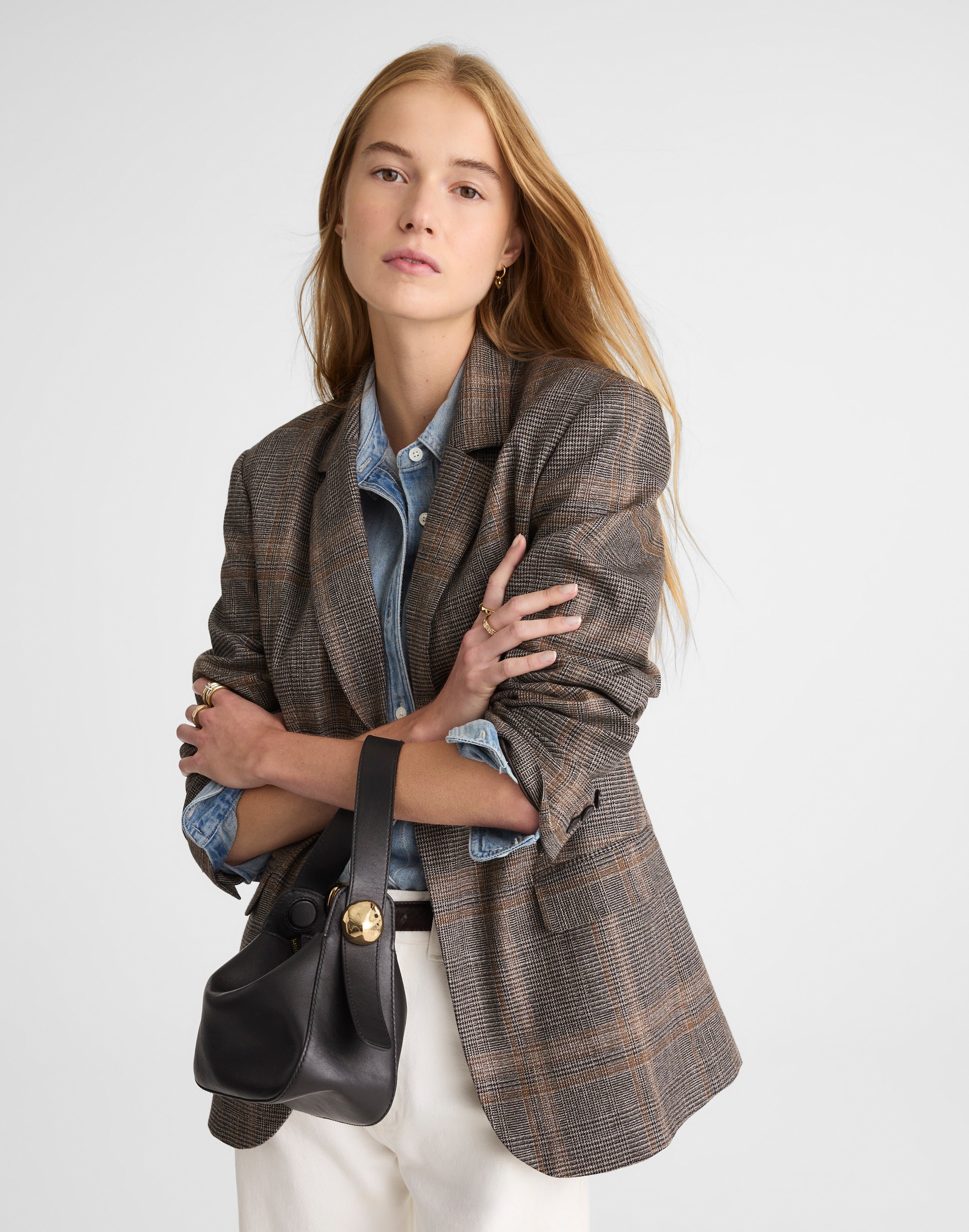The Sculpted Metal Wristlet Bag