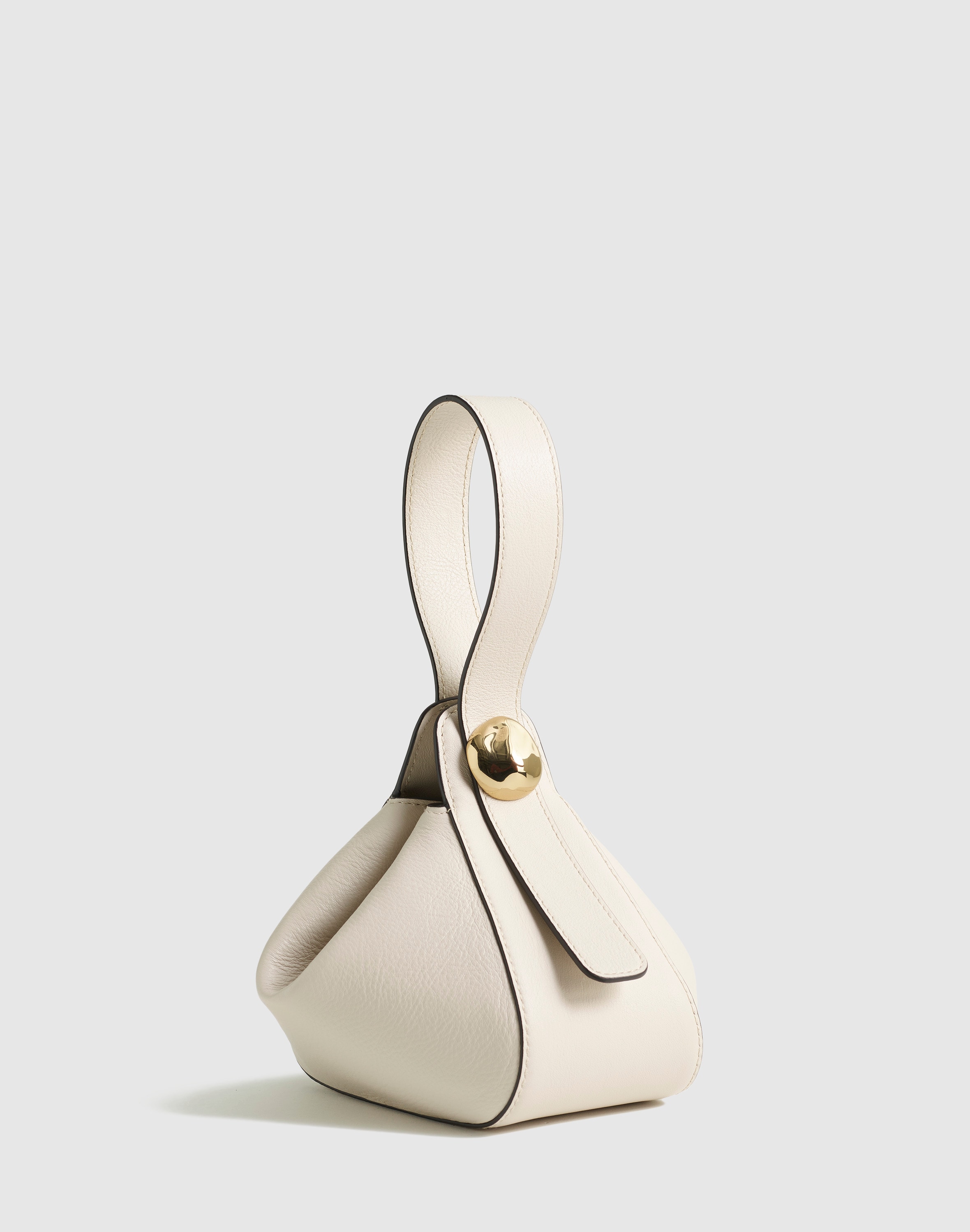 The Sculpted Metal Wristlet Bag