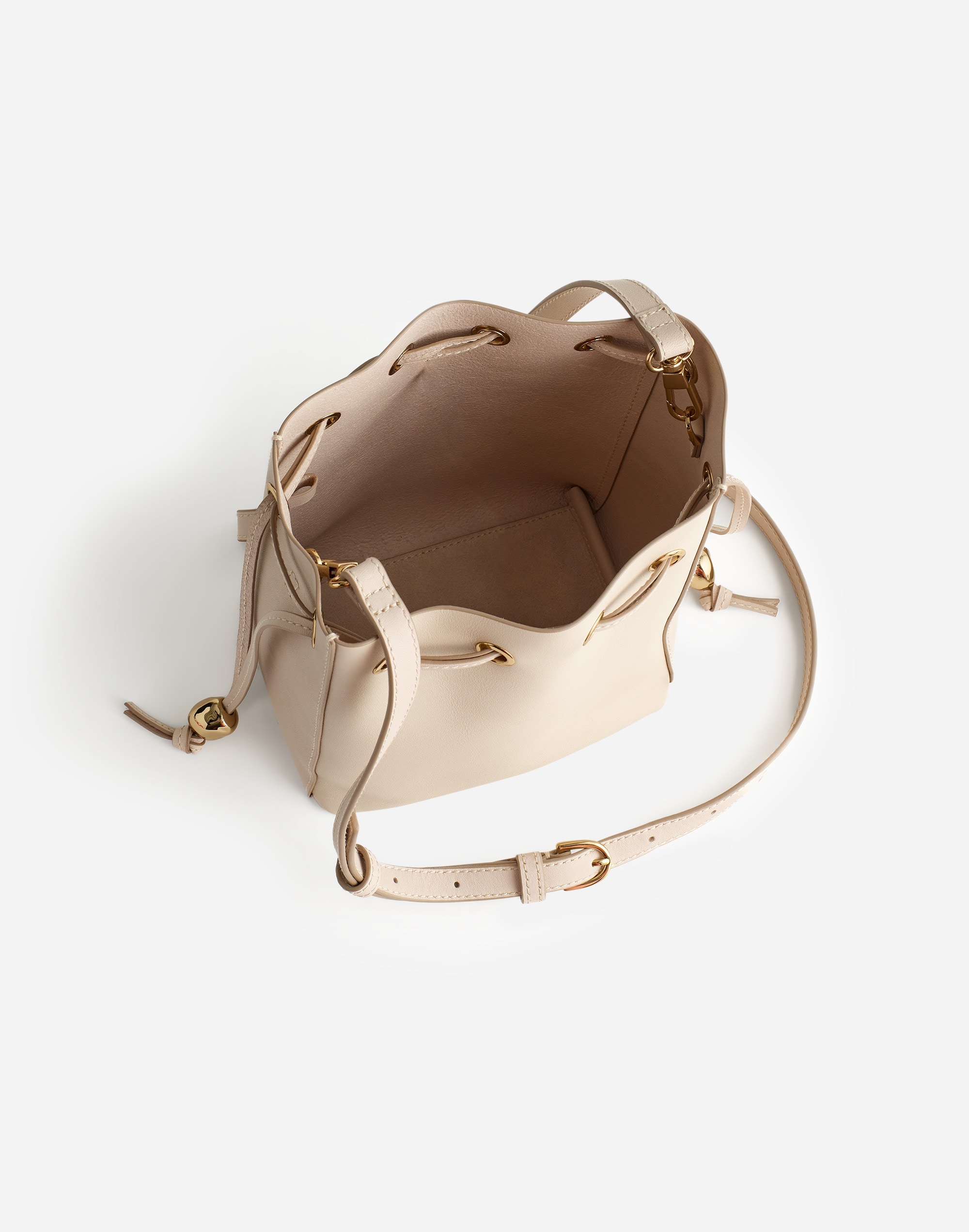 The Mini Drawstring Crossbody Bucket Bag