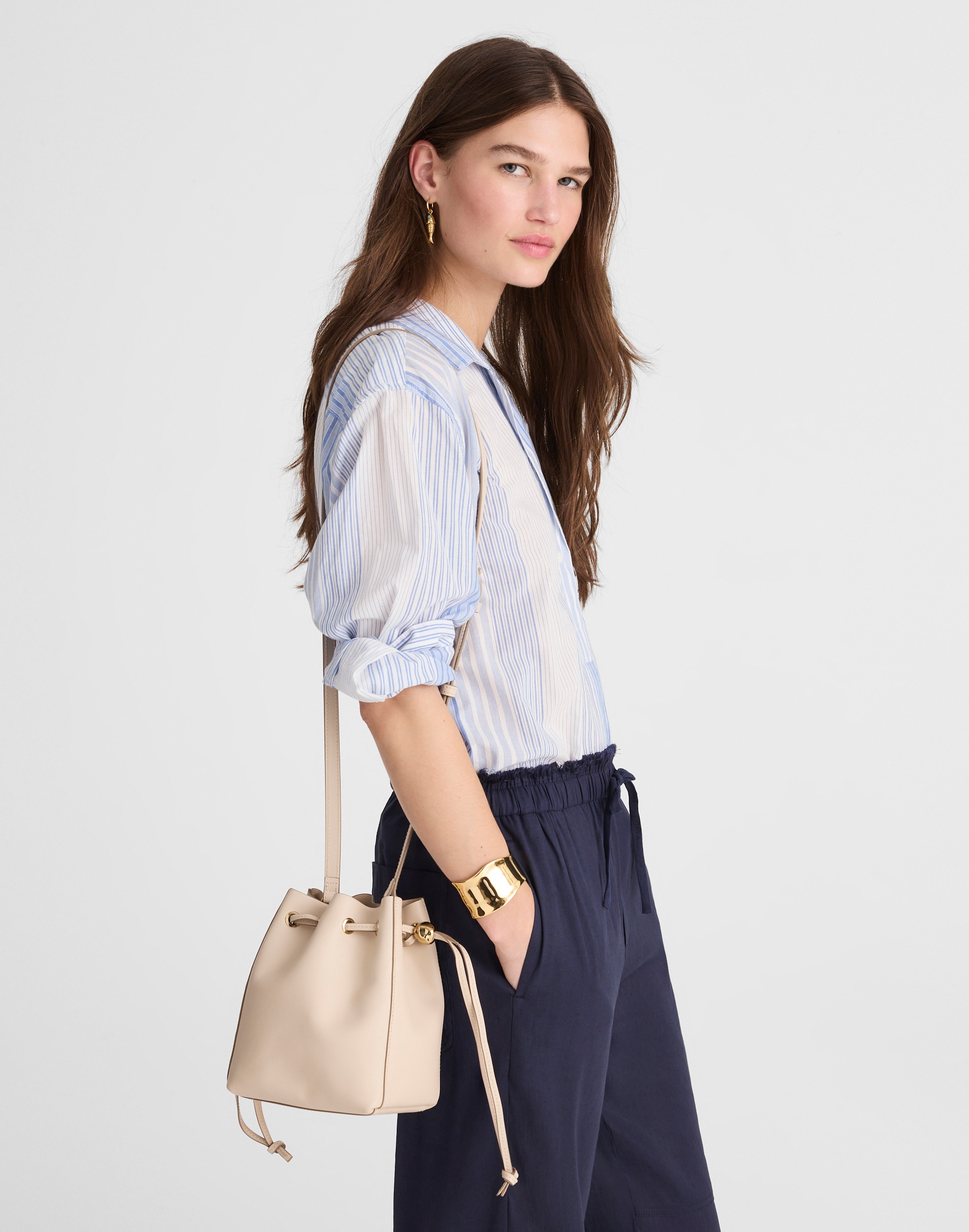 The Mini Drawstring Crossbody Bucket Bag