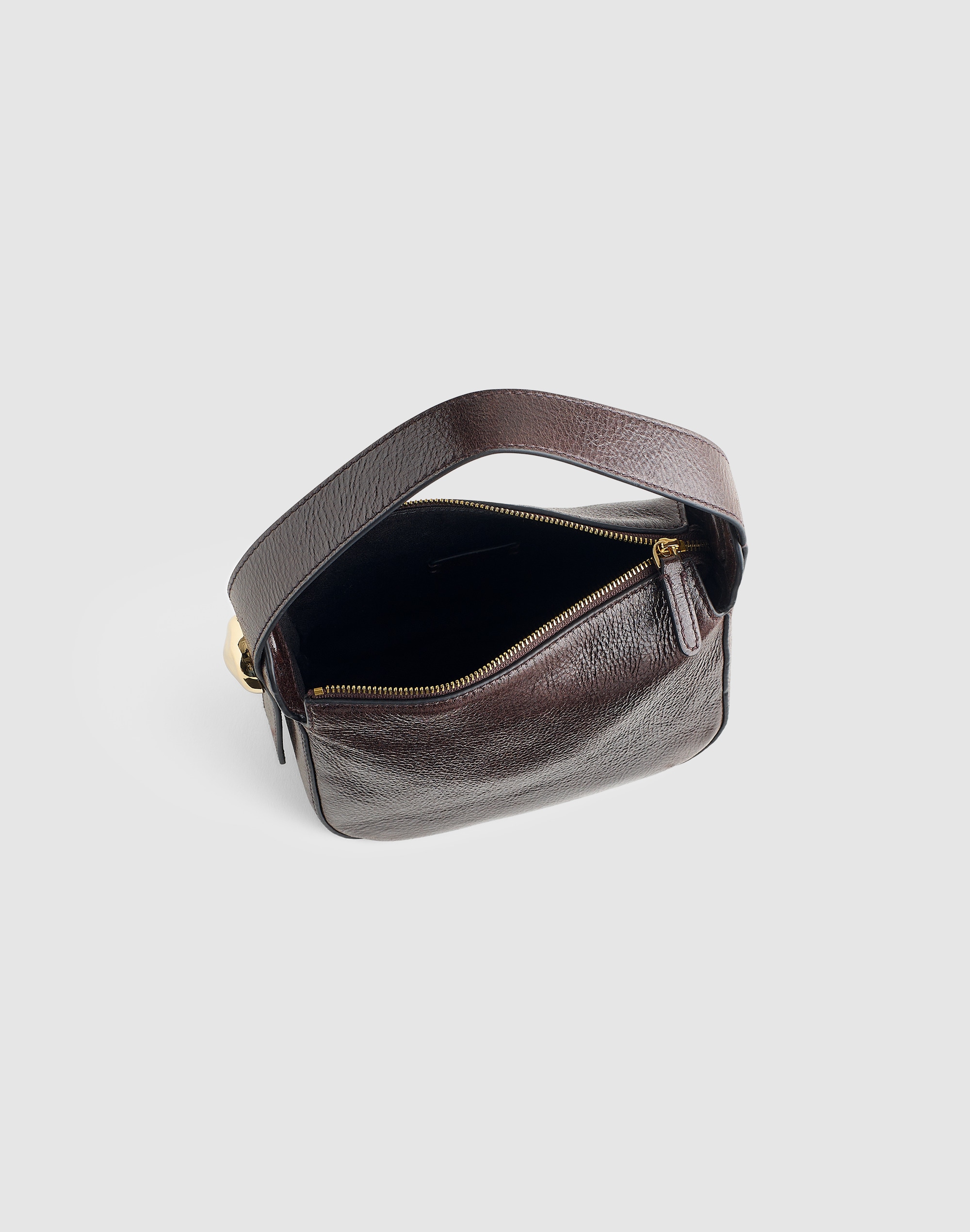 The Sculpted Metal Wristlet Bag