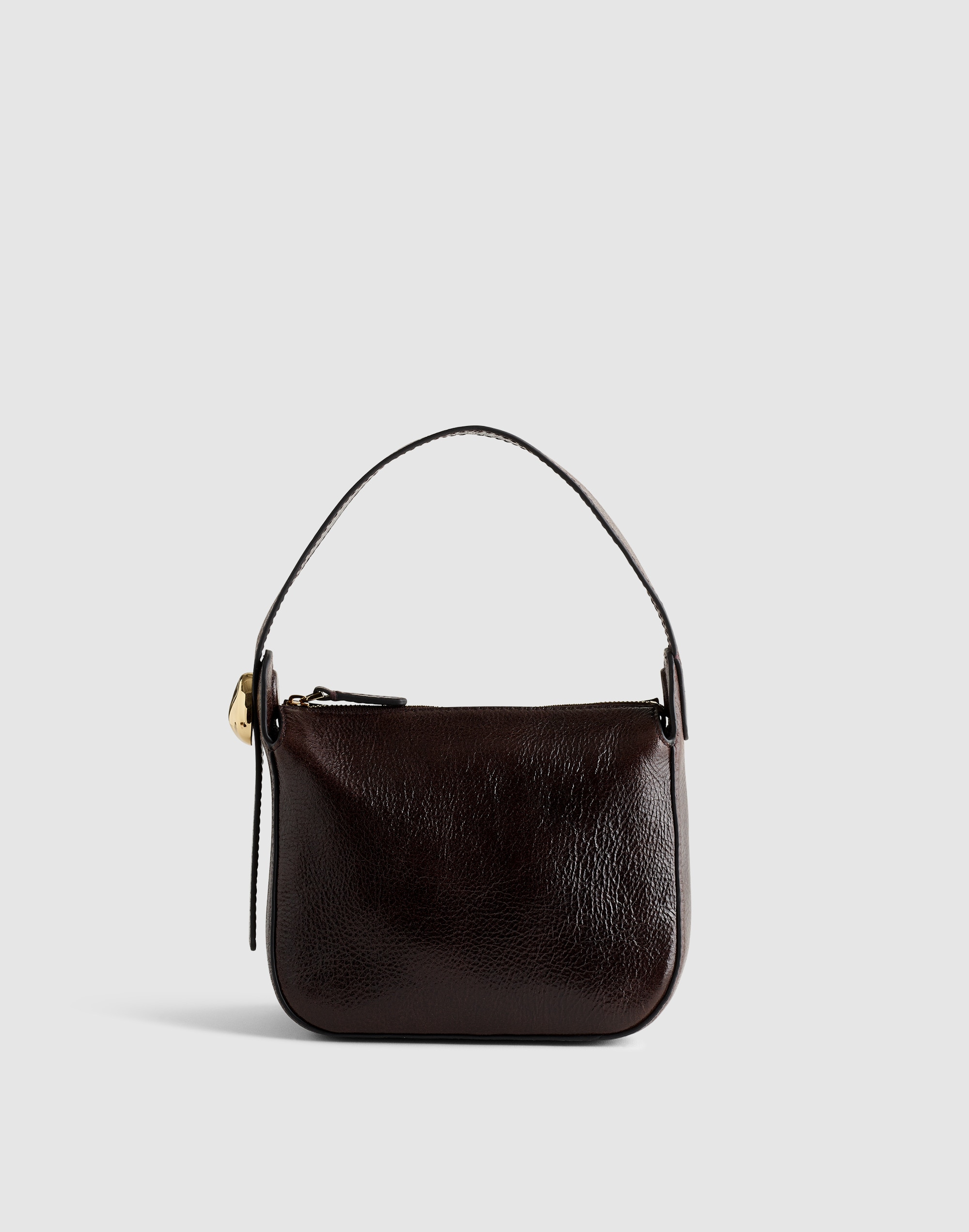 The Sculpted Metal Wristlet Bag