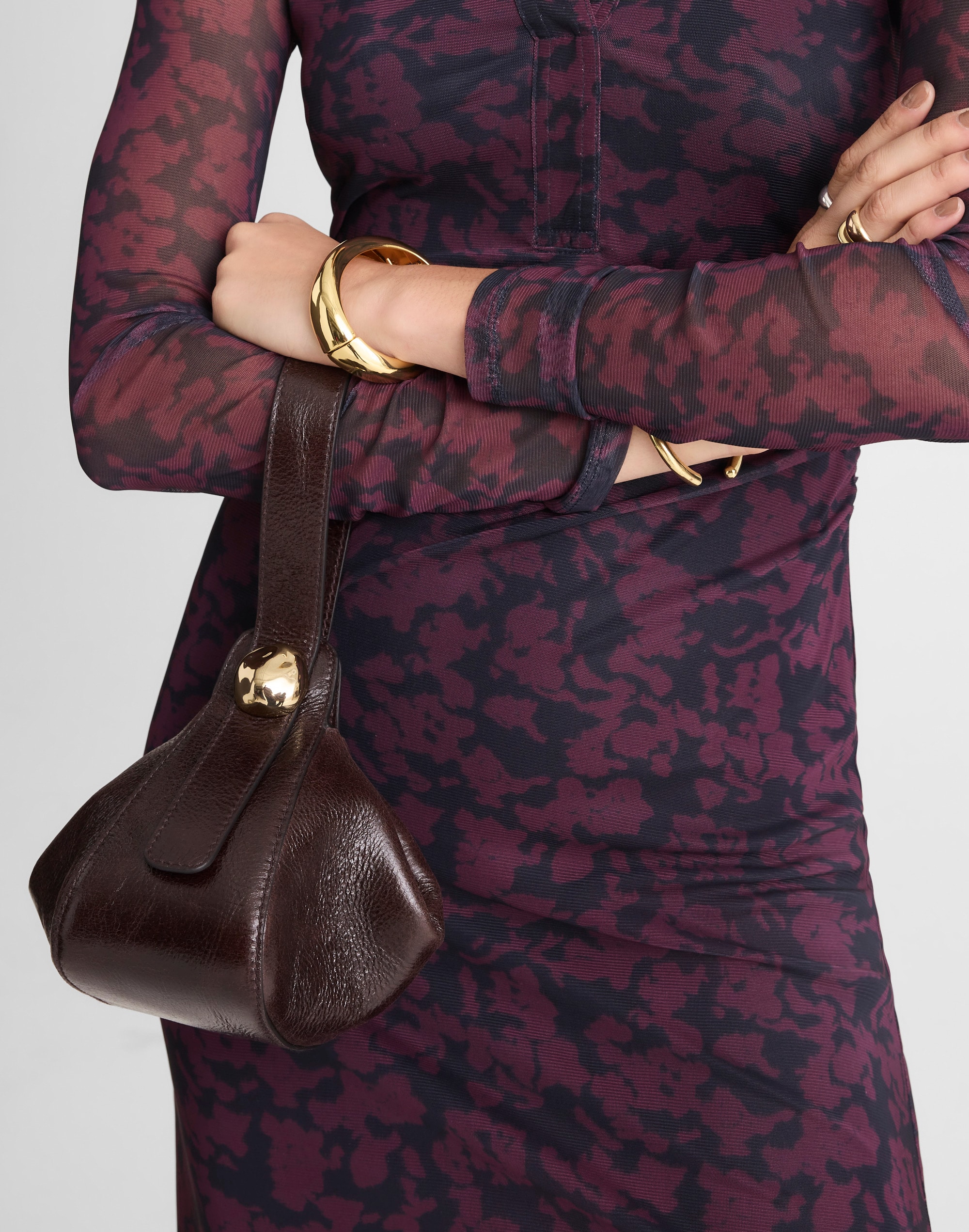 The Sculpted Metal Wristlet Bag