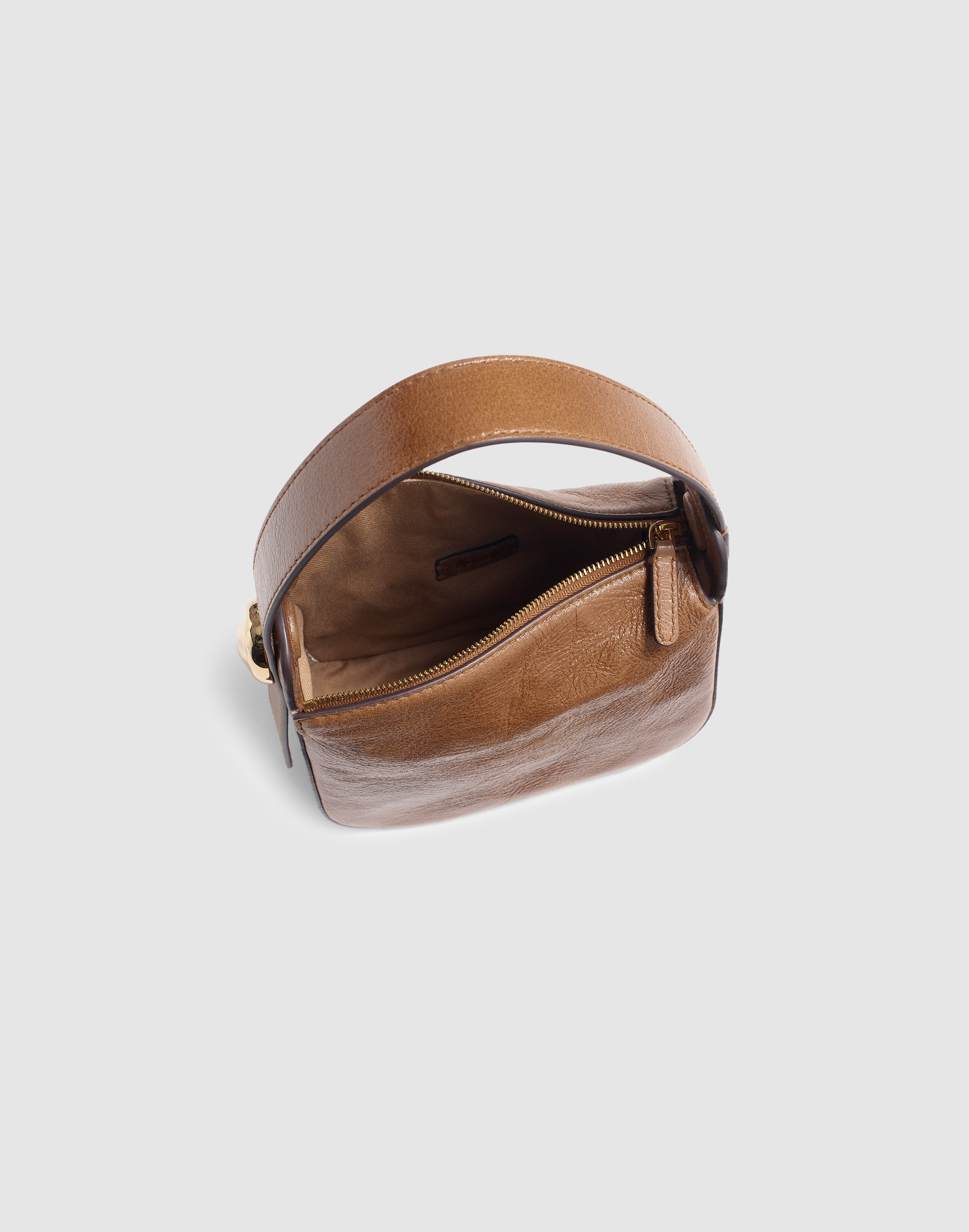 The Sculpted Metal Wristlet Bag