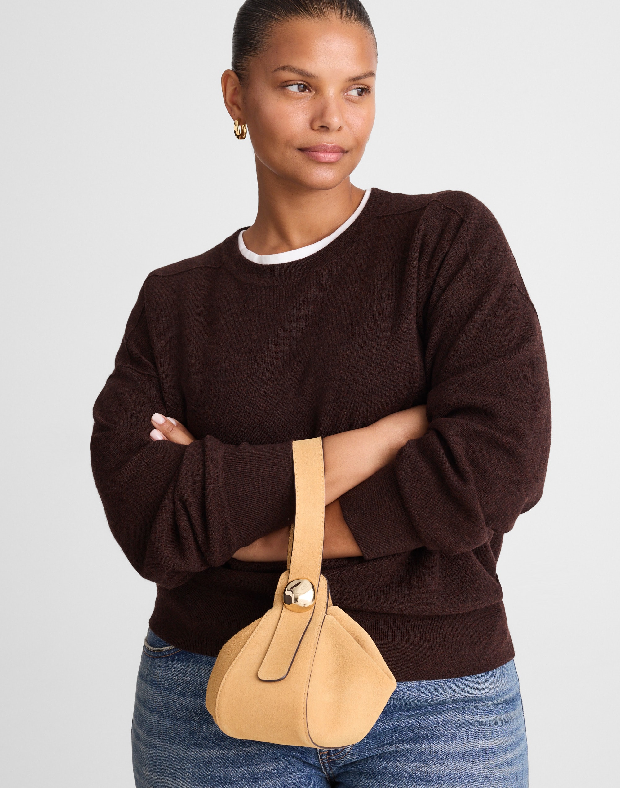 The Sculpted Metal Wristlet Bag