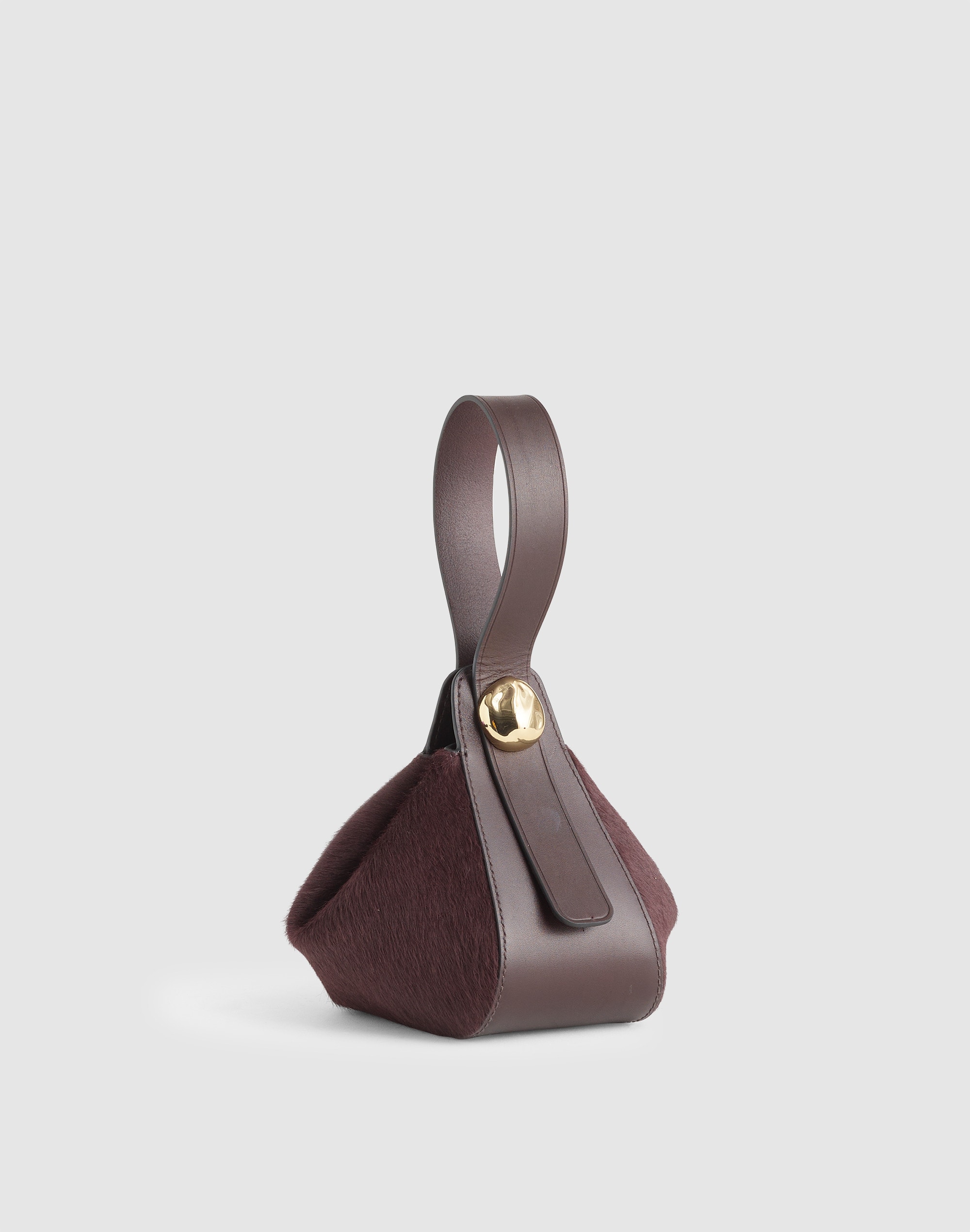 The Sculpted Metal Wristlet Bag