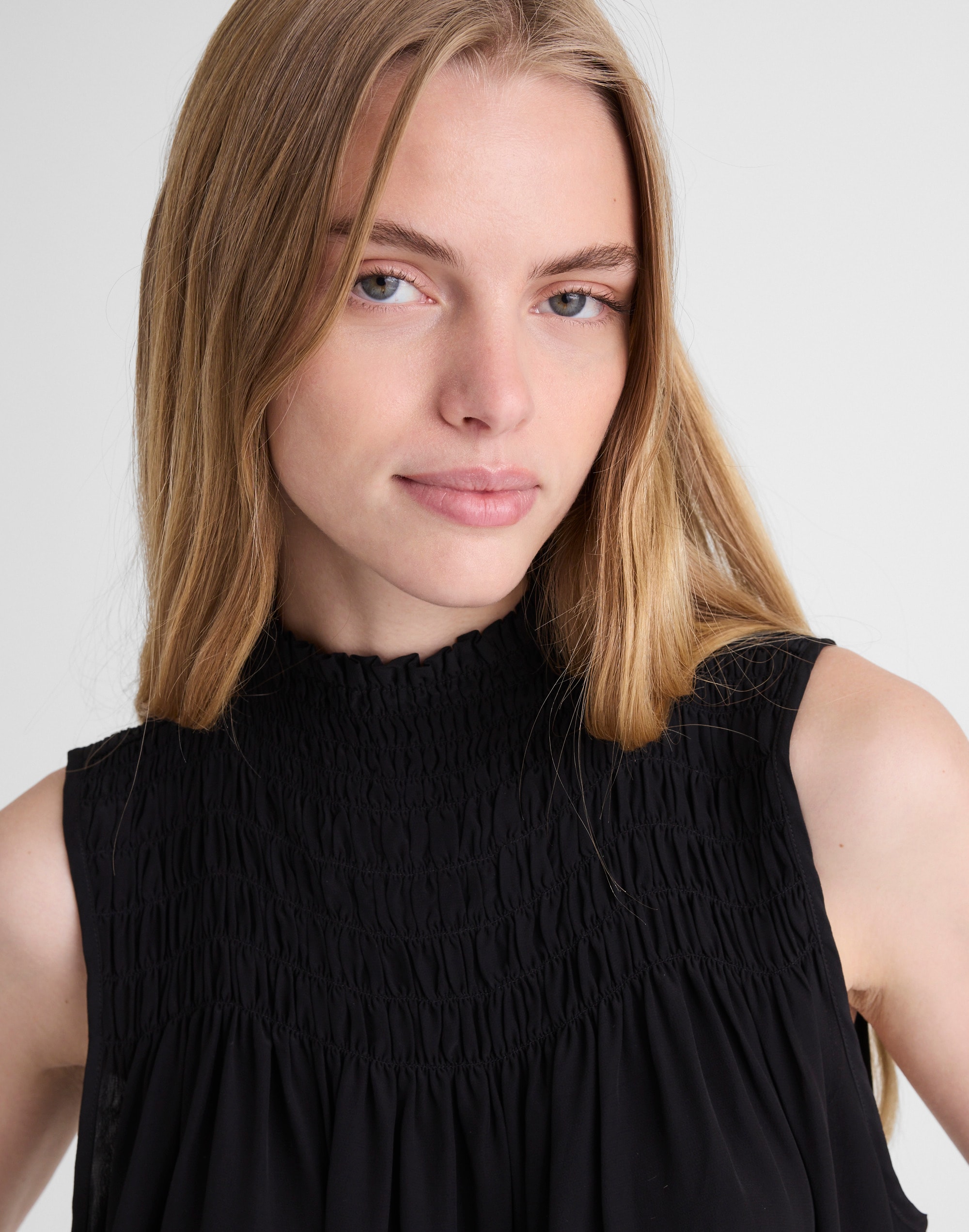 Smocked Mockneck Sleeveless Top