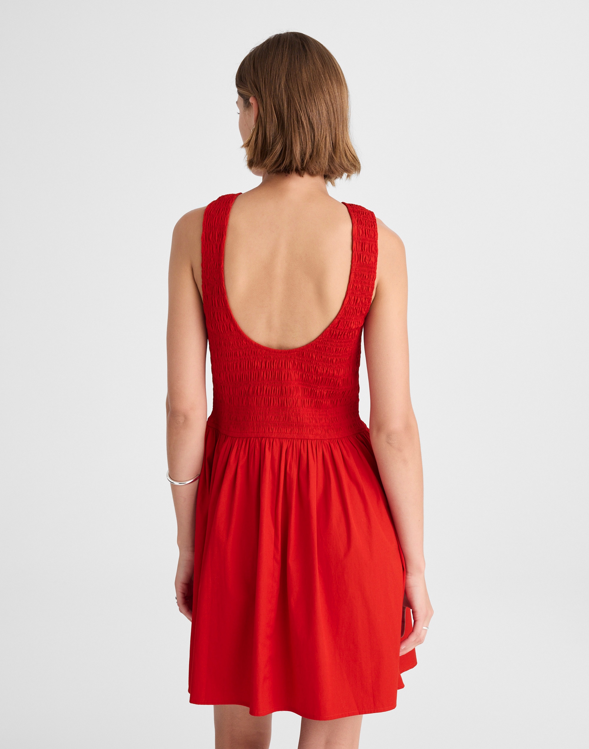 The Melody Scoopback Smocked Mini Dress