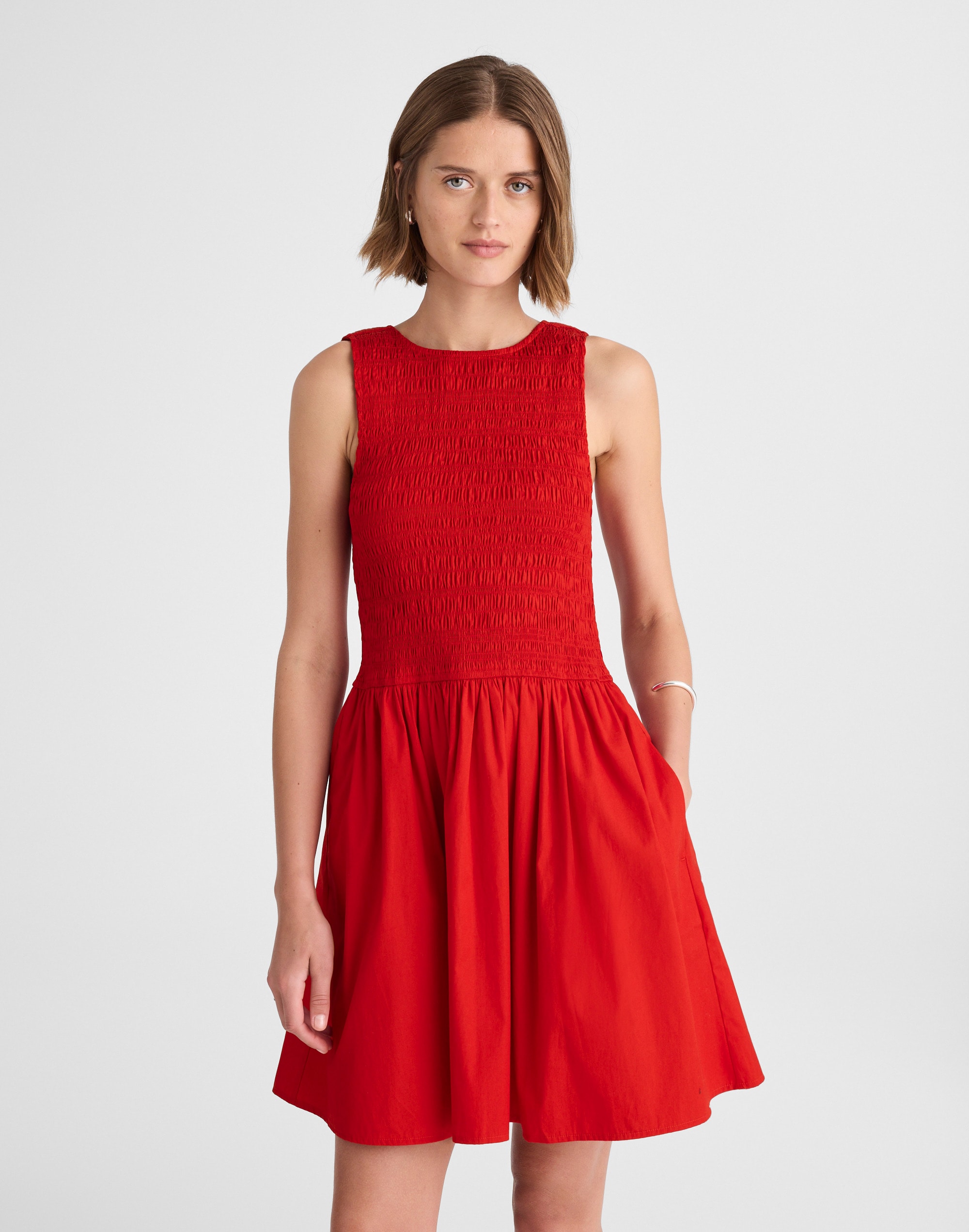 the melody scoopback smocked mini dress
