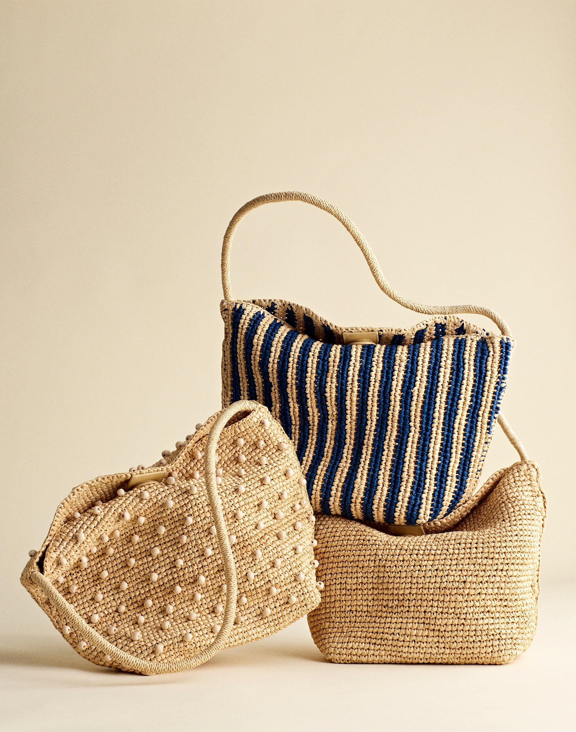 The Signature Woven Shoulder Bag in Raffia
