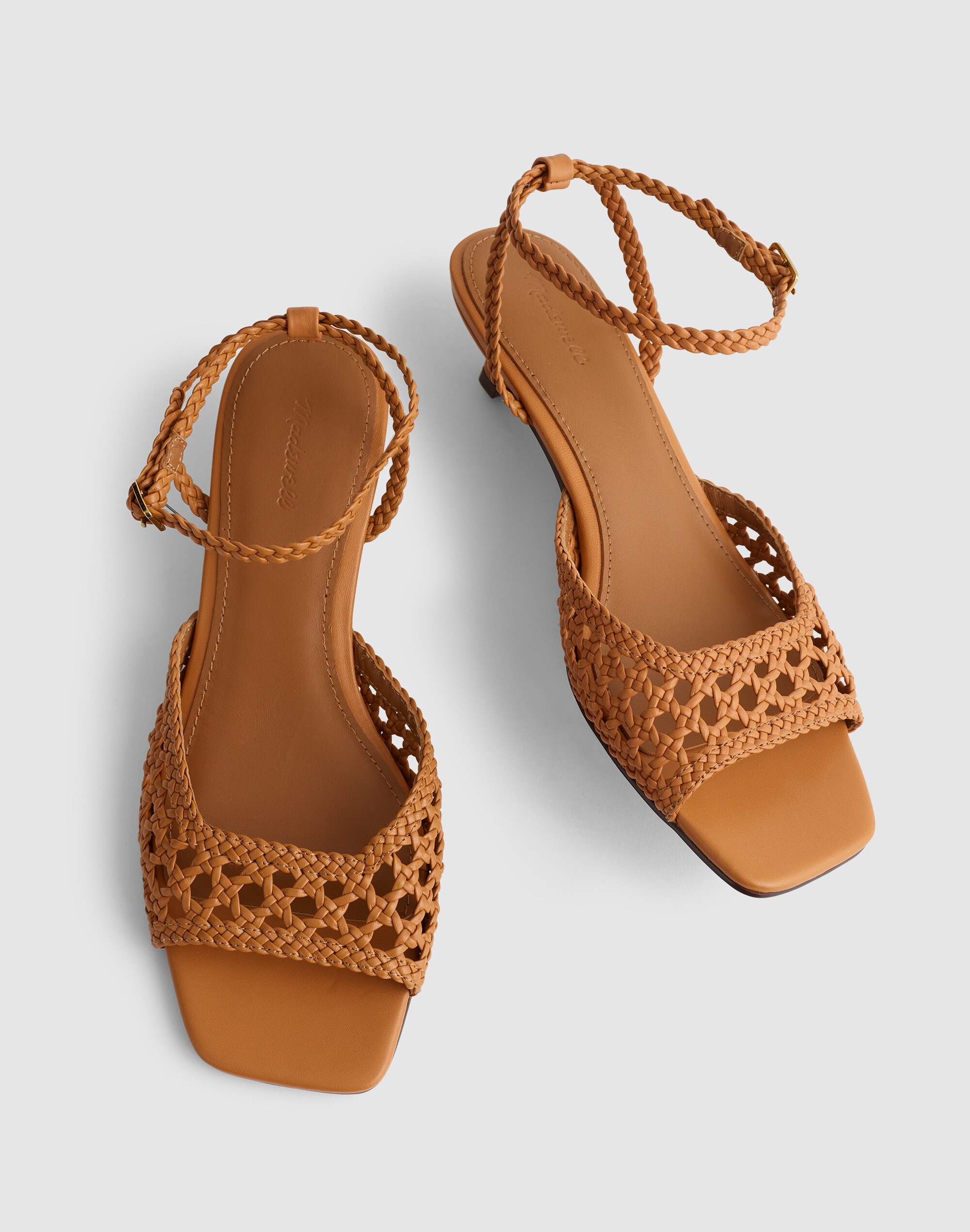 The Tyra Ankle-Strap Kitten-Heel Sandal in Woven Leather