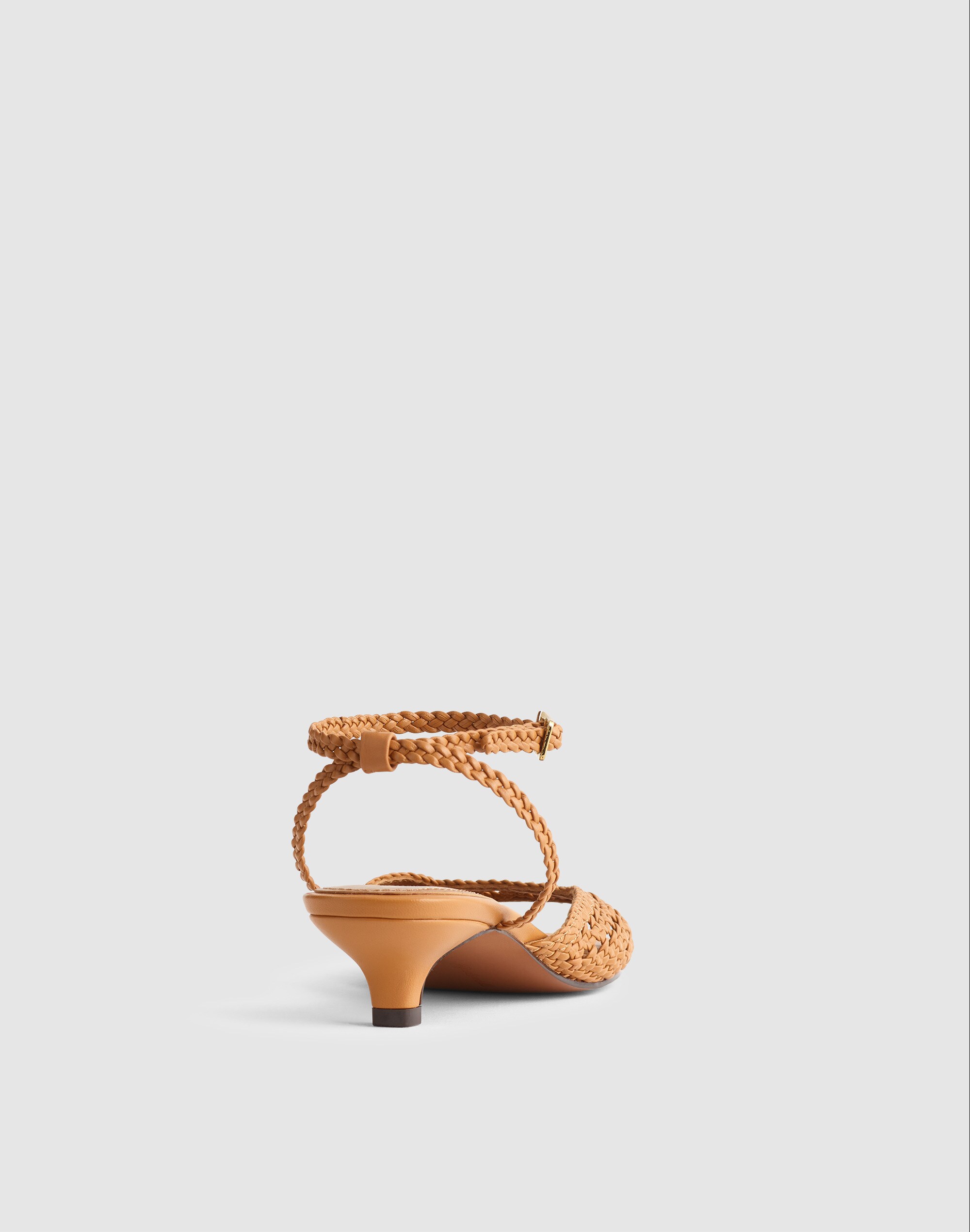 The Tyra Ankle-Strap Kitten-Heel Sandal in Woven Leather