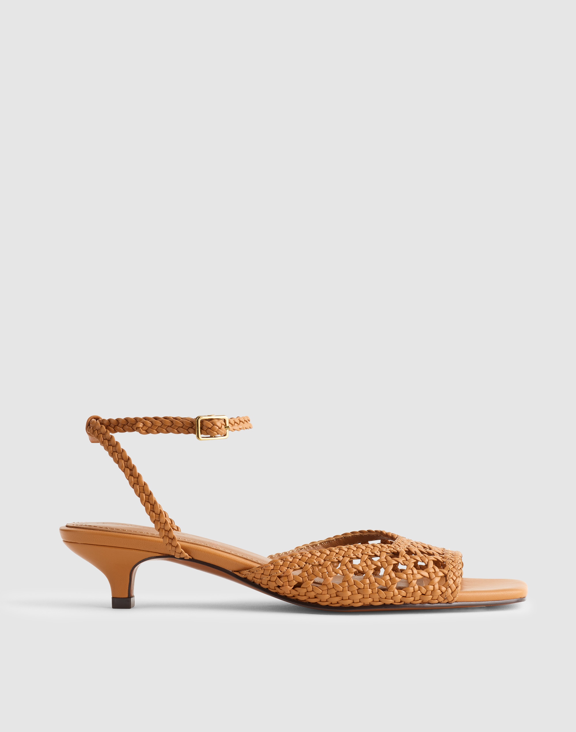 The Tyra Ankle-Strap Kitten-Heel Sandal in Woven Leather
