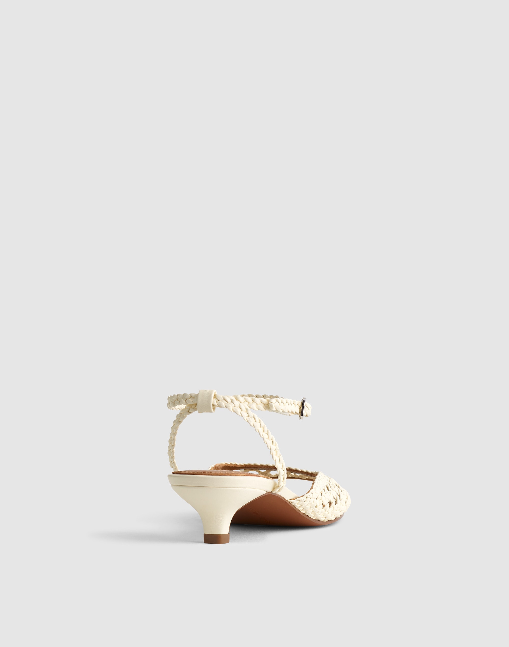 The Tyra Ankle-Strap Kitten-Heel Sandal in Woven Leather