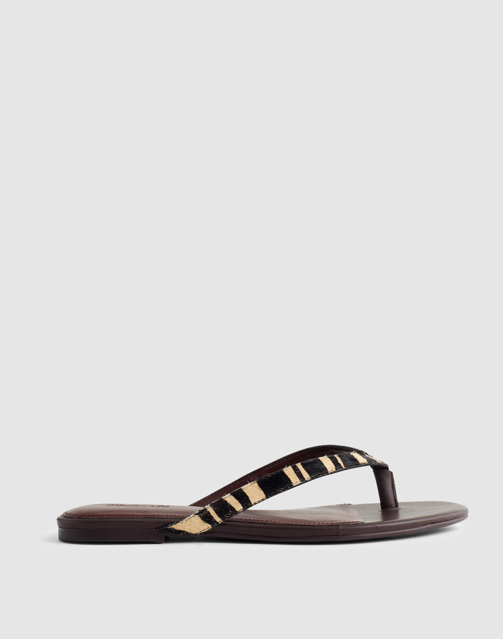 the iggy thong sandal in zebra-print haircalf