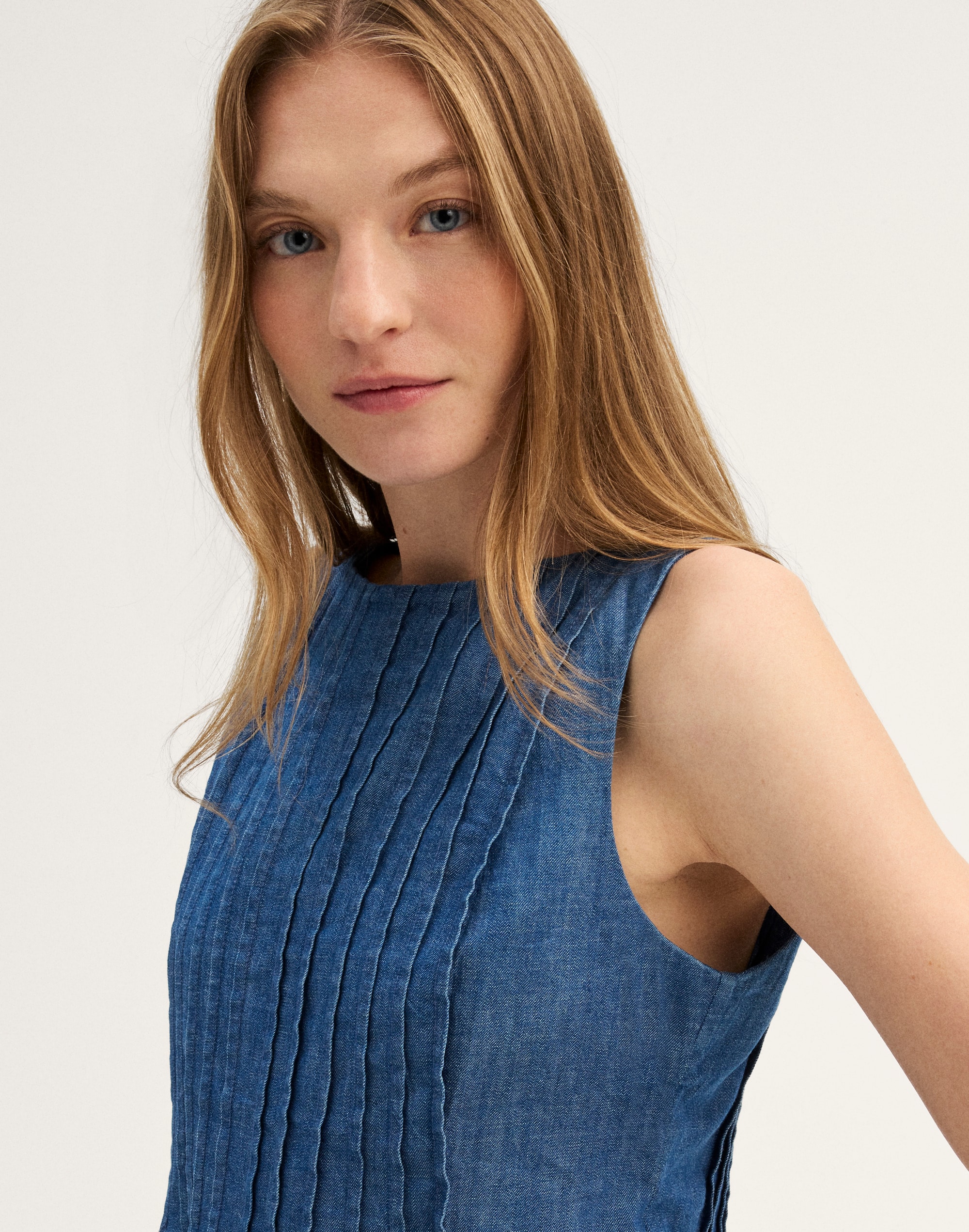 Denim Pintuck Peplum Top