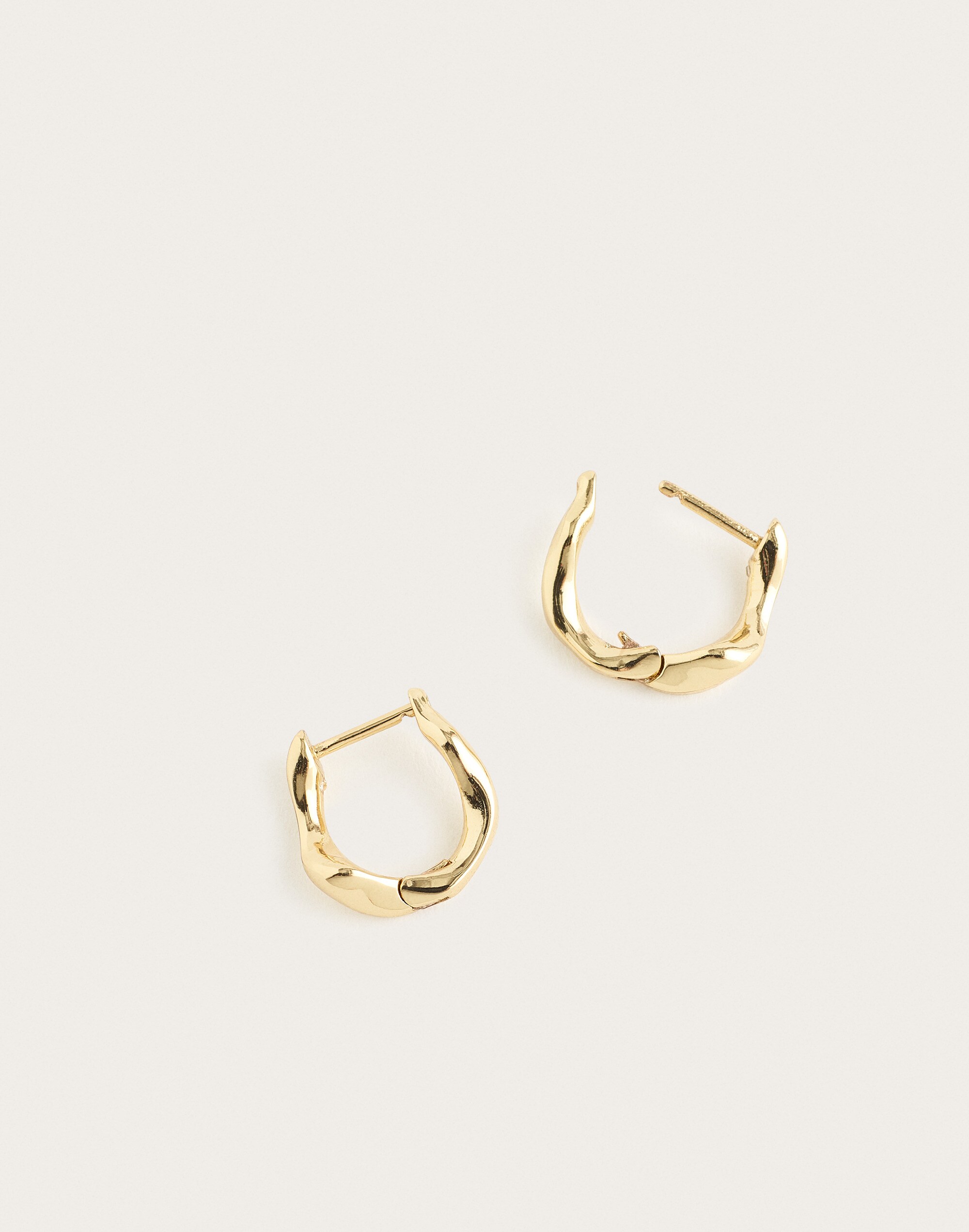 sculptural twisted huggie hoop earrings